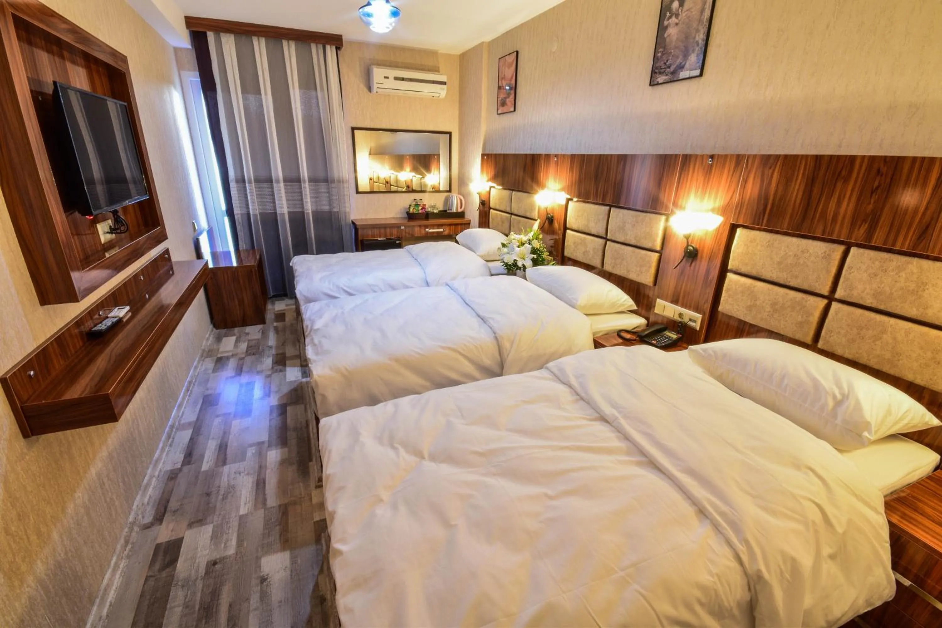 Bed in MARİNA HOTEL