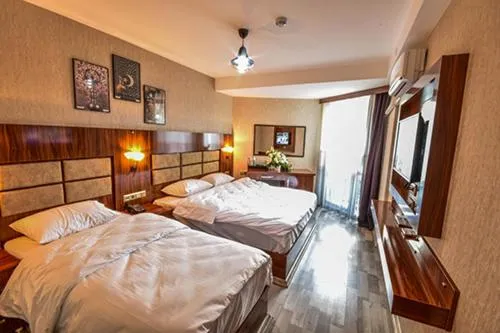 Bed in MARİNA HOTEL