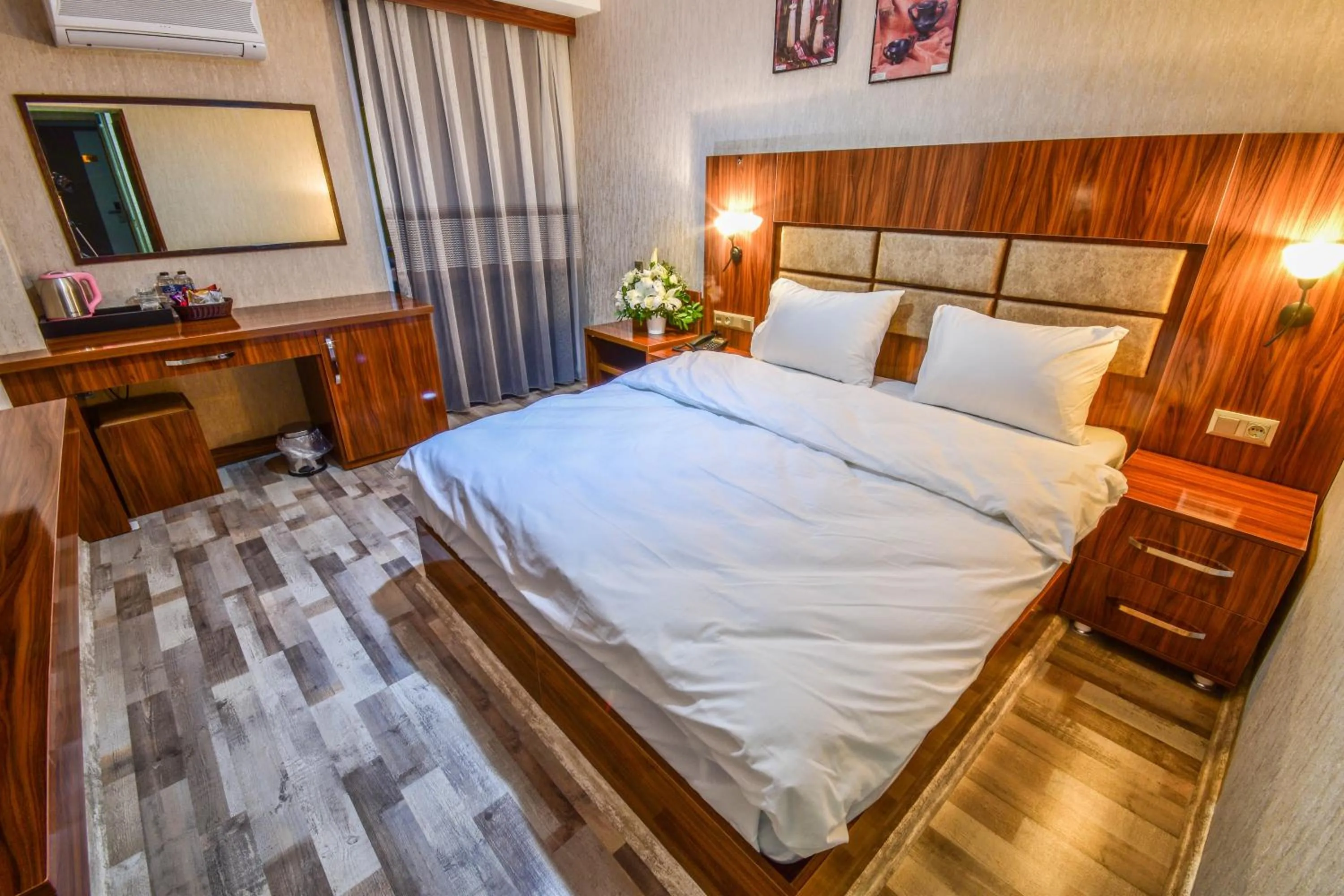 Bed in MARİNA HOTEL