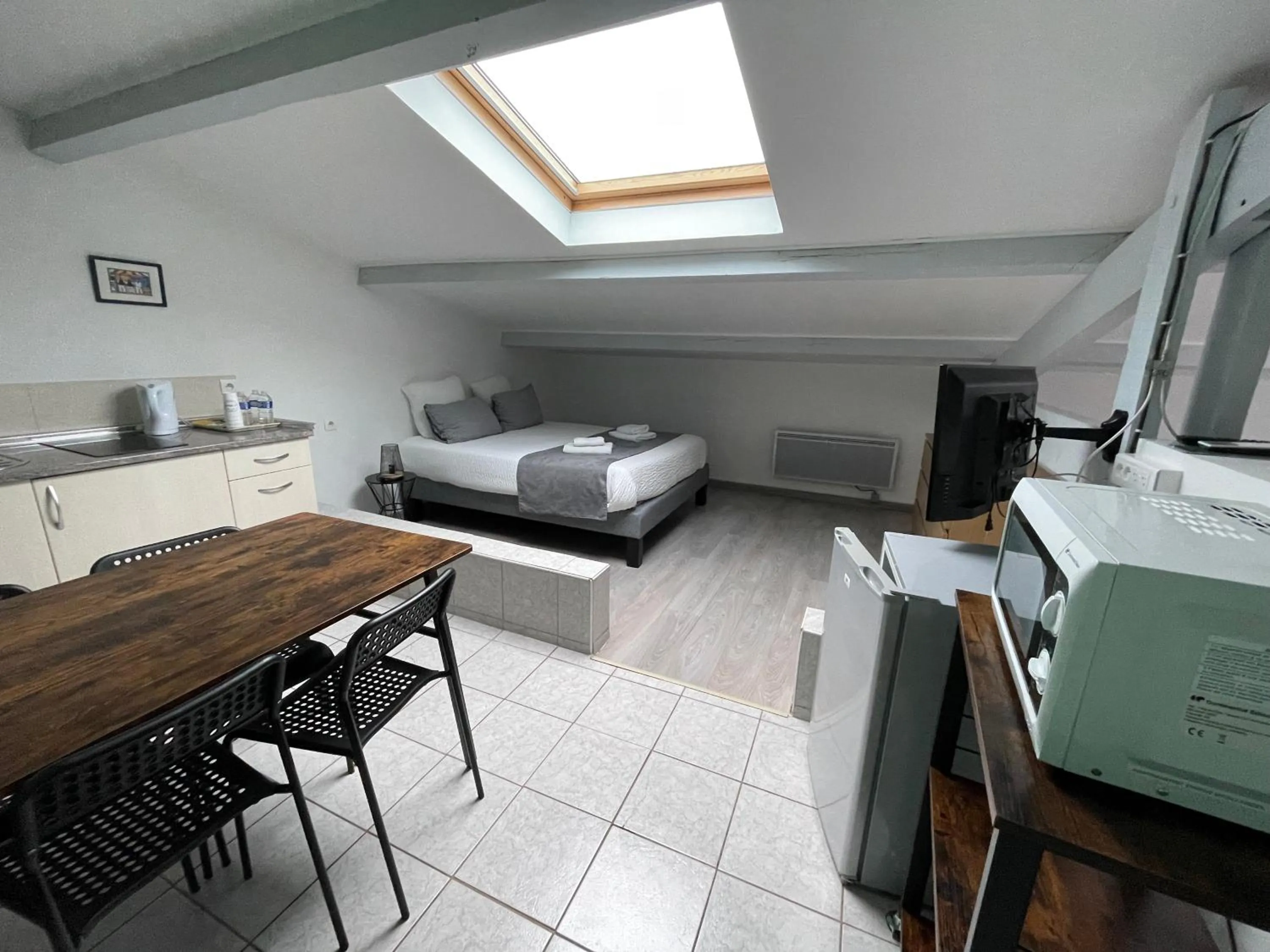 Kitchen or kitchenette in Hôtel Paris Madrid