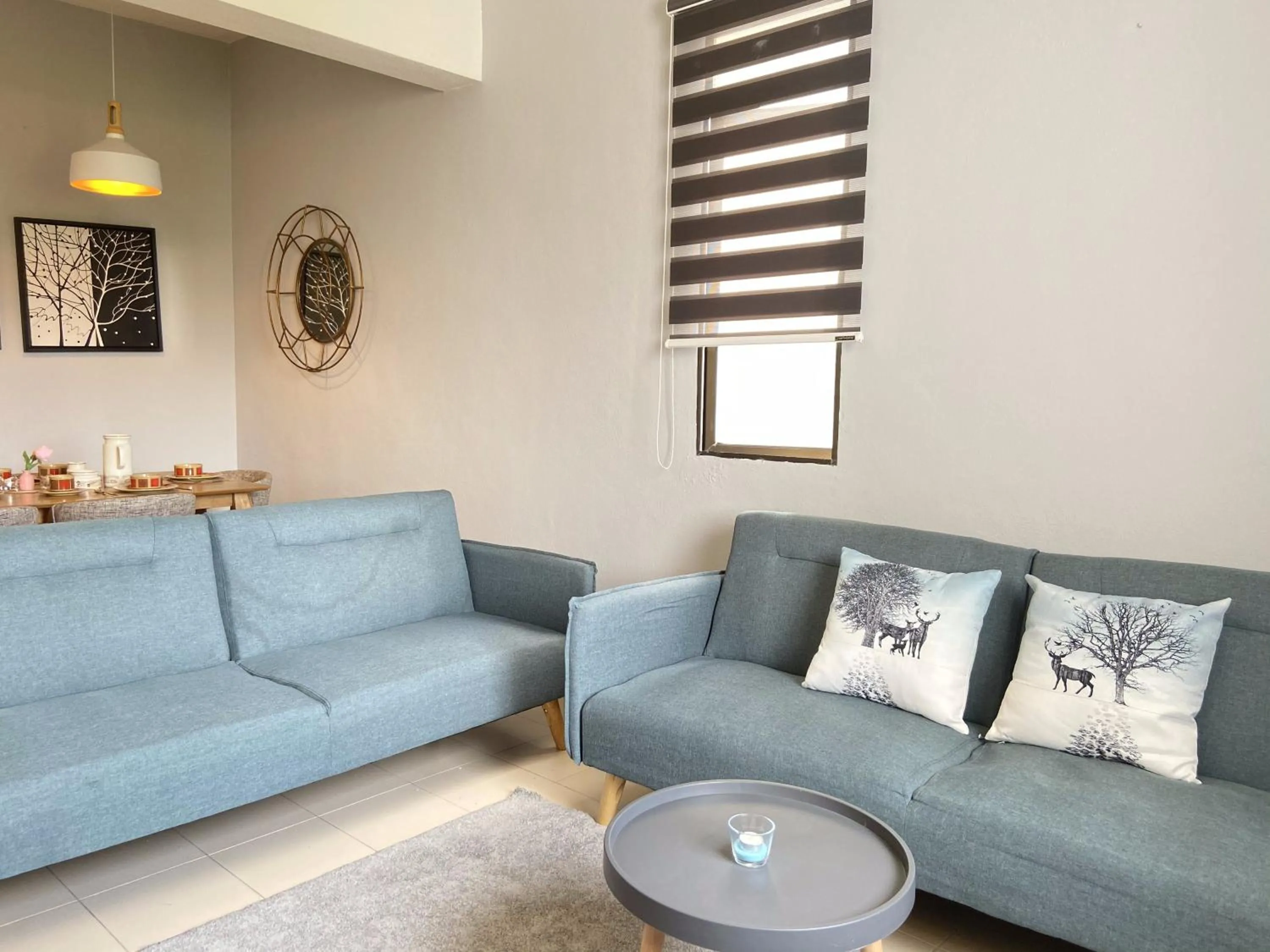 Living room in Arcadia Penang by Plush