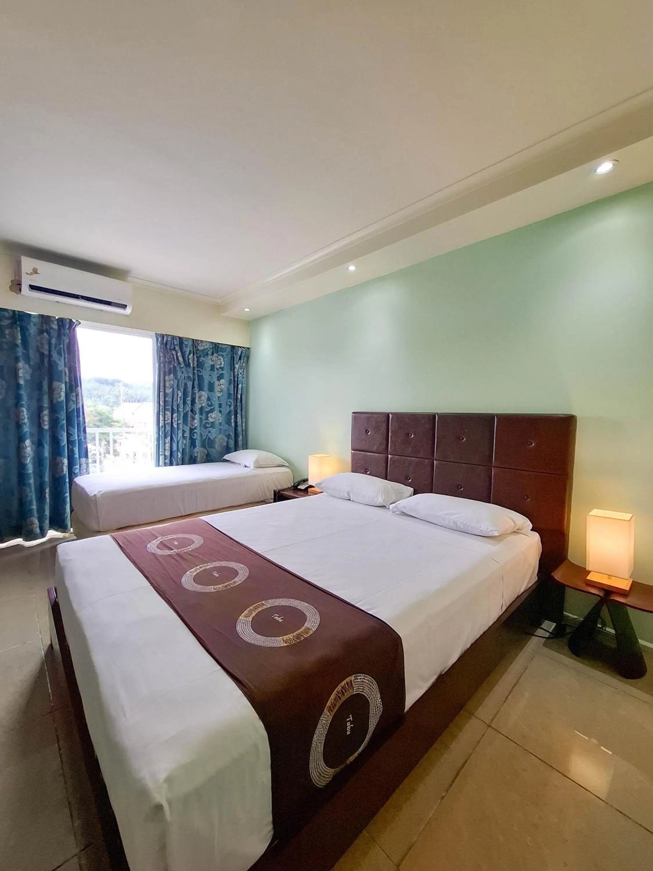 Bed in Gazelle International Hotel