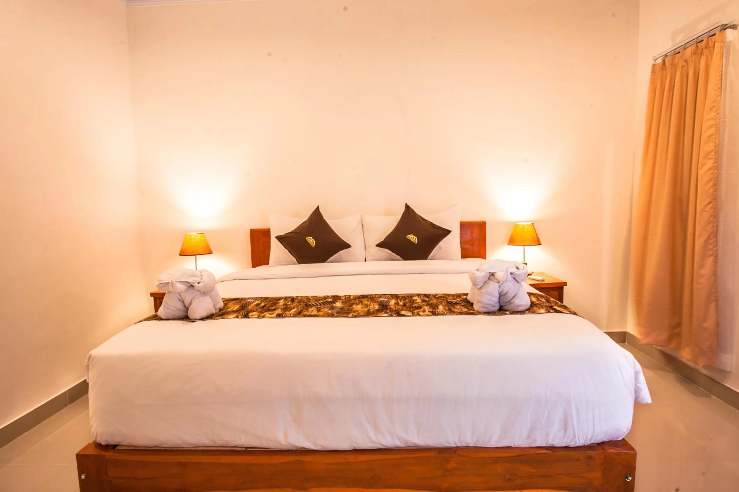 Photo of the whole room, Bed in Singgahan Bungalow by ecommerceloka