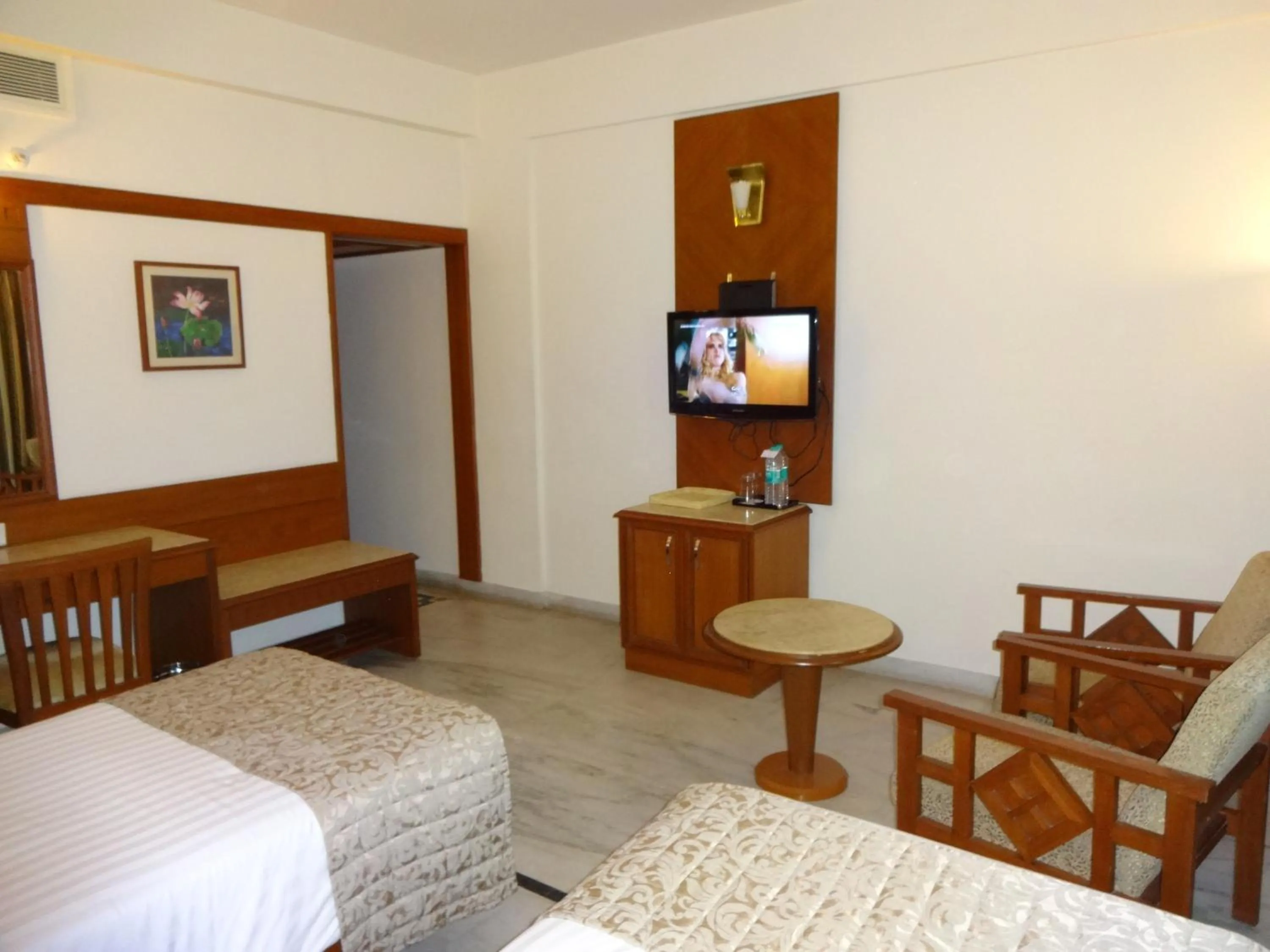 Photo of the whole room, Bed in JP Chennai Hotel