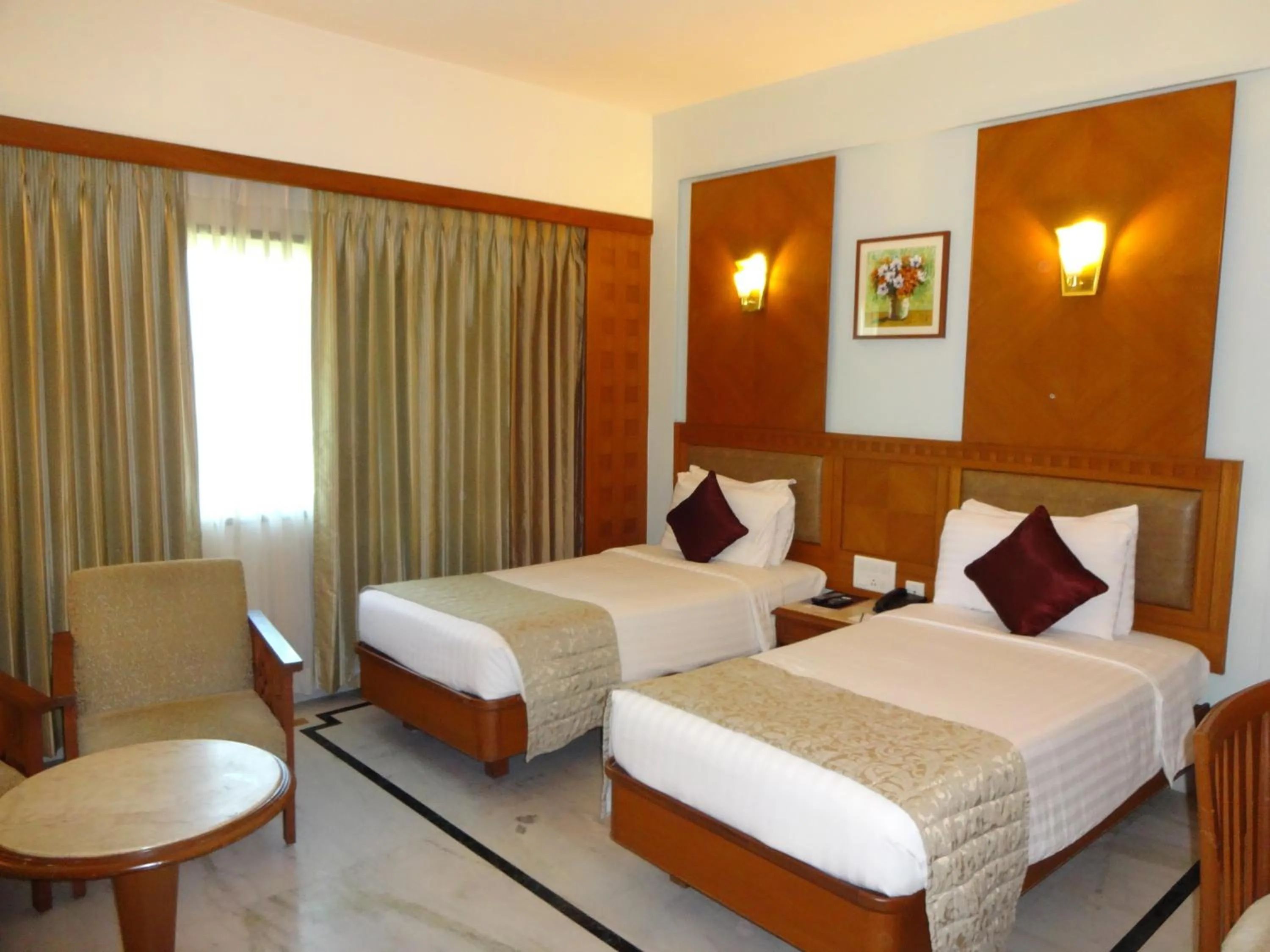 Photo of the whole room, Bed in JP Chennai Hotel