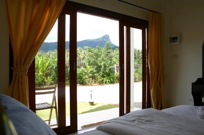 View (from property/room), Bed in Naga Peak Resort