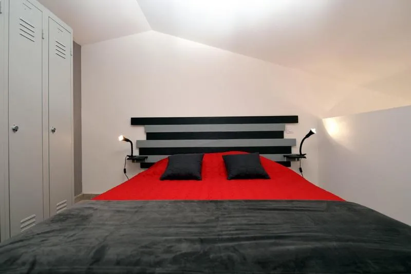 Bed in Sous Les Pins gîtes et chambres d'hôtes