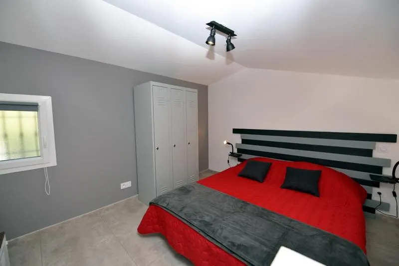 Bed in Sous Les Pins gîtes et chambres d'hôtes