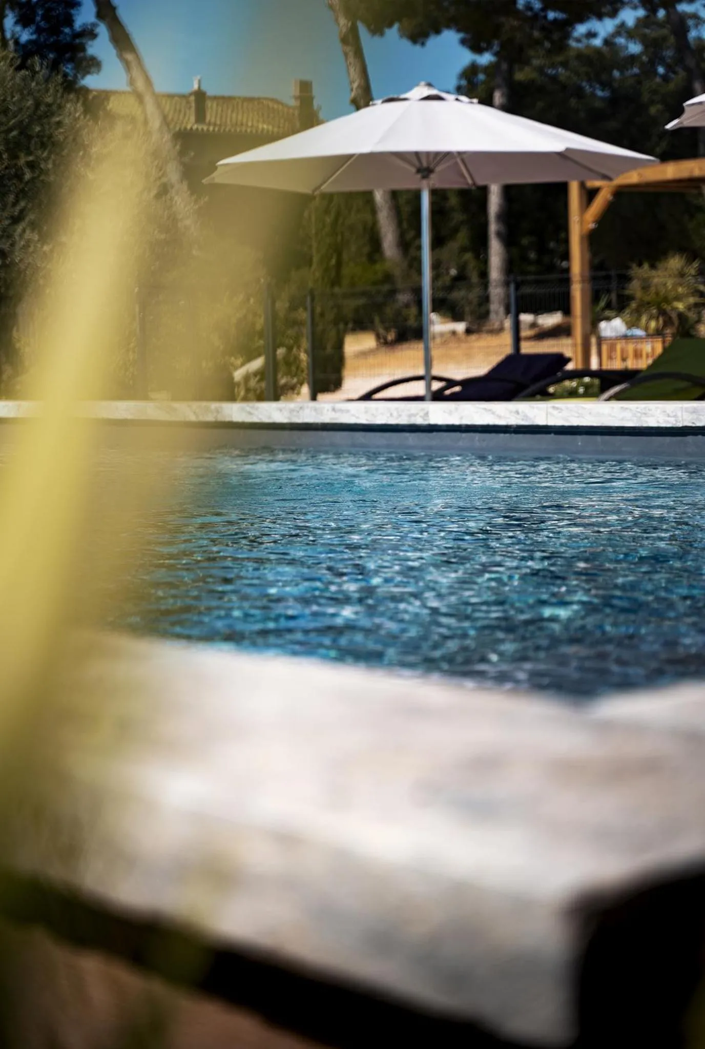 Swimming pool in Sous Les Pins gîtes et chambres d'hôtes