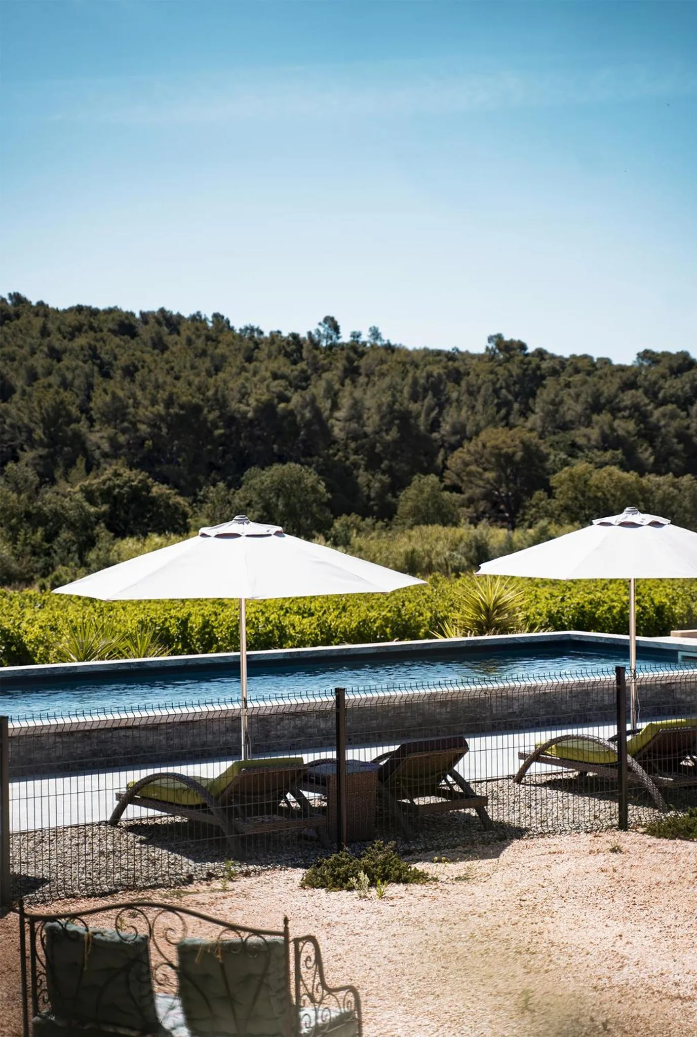 Swimming pool in Sous Les Pins gîtes et chambres d'hôtes