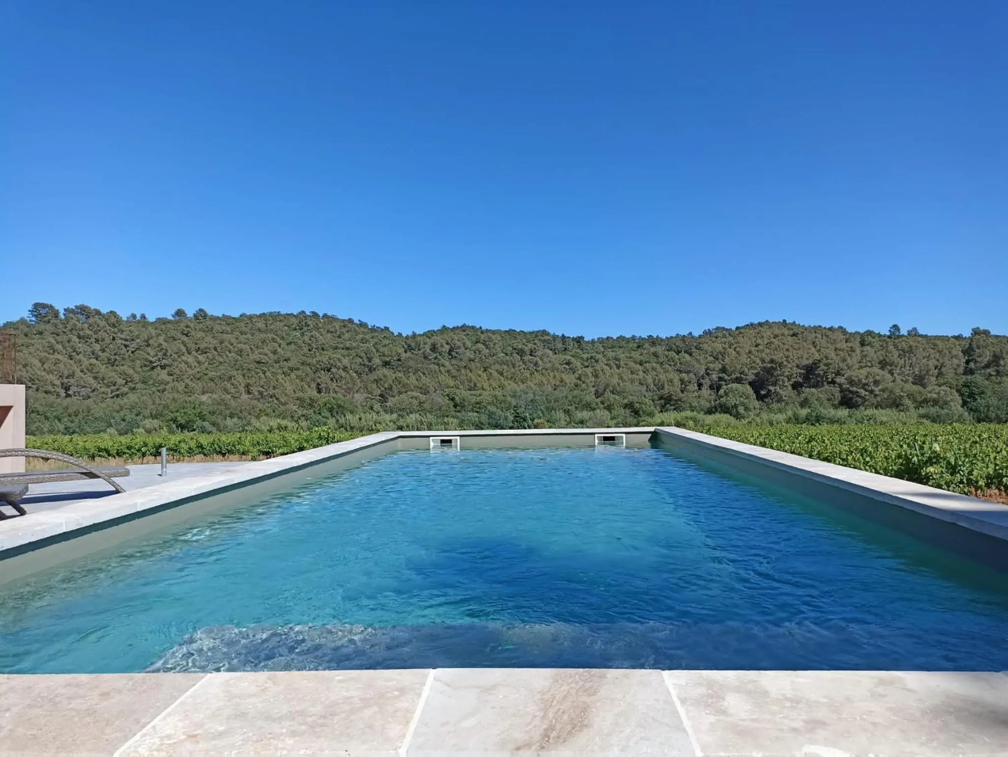 Swimming pool in Sous Les Pins gîtes et chambres d'hôtes