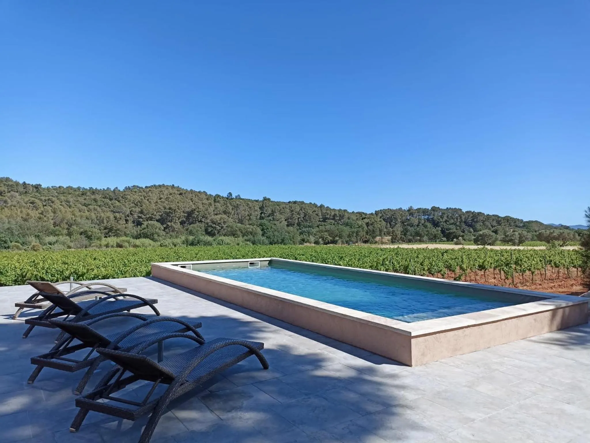 Swimming pool in Sous Les Pins gîtes et chambres d'hôtes