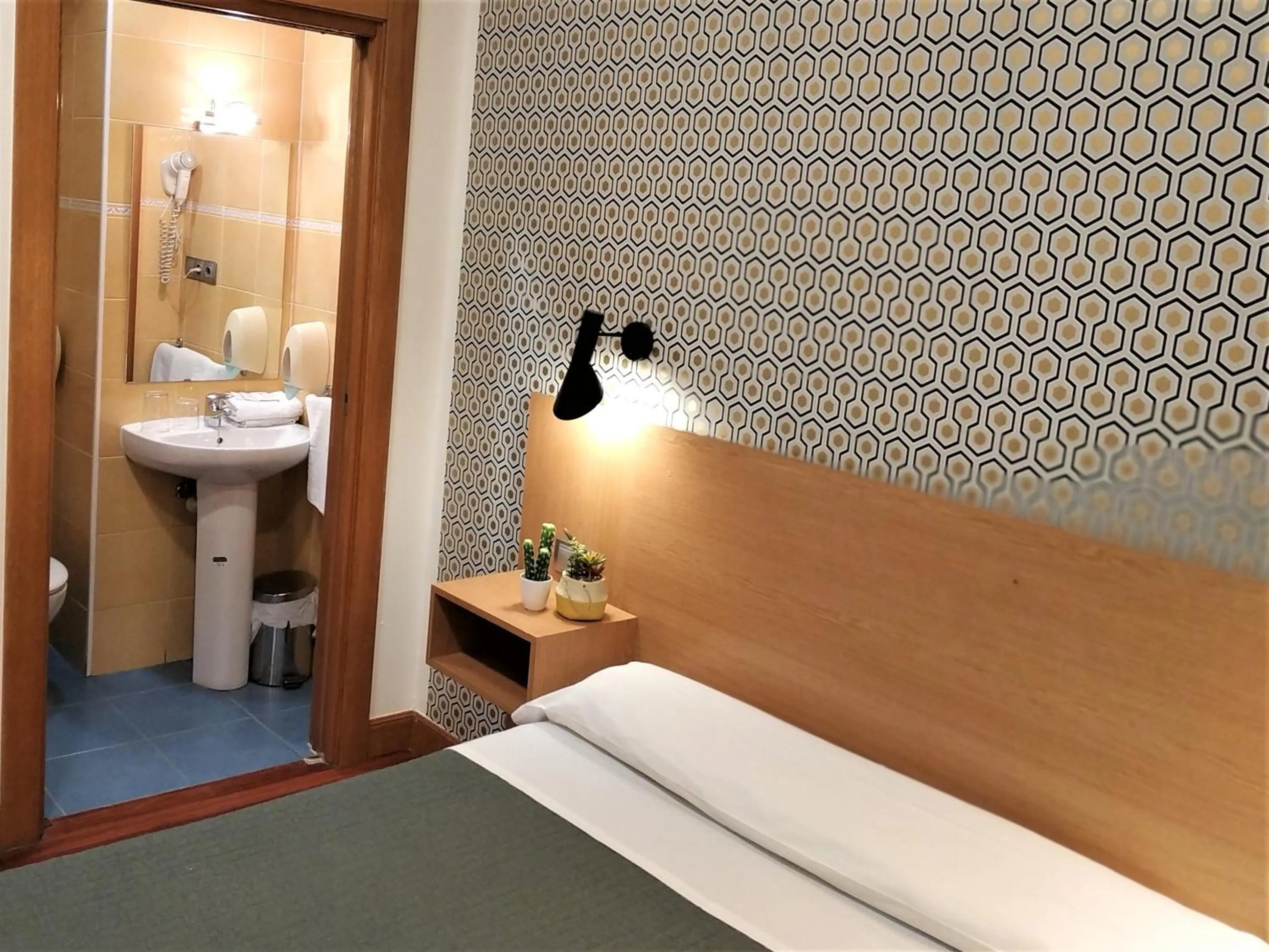 Bed in Roquefer Bilbao Central Rooms