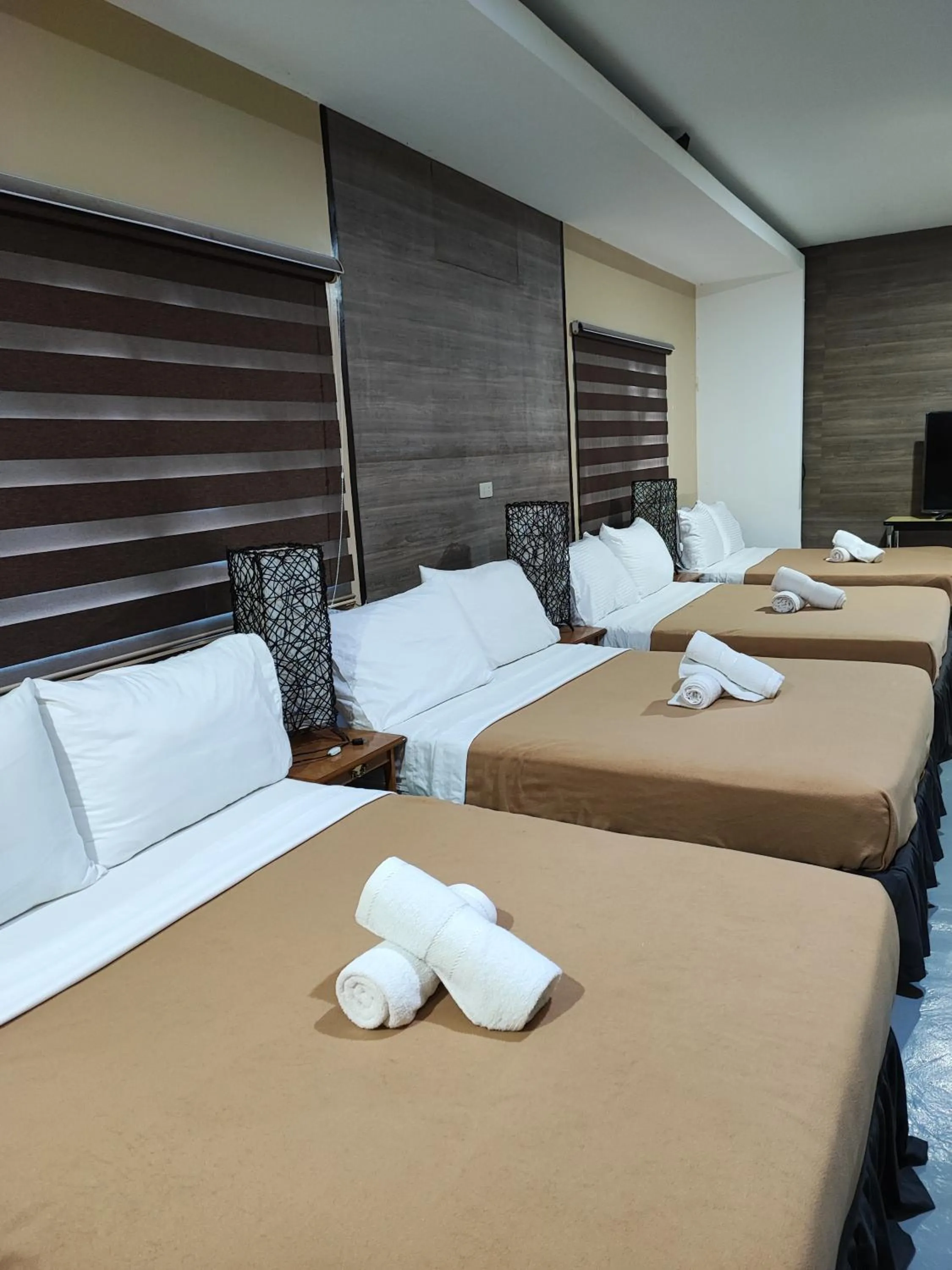 Bed in Raya Del Sol Dive Resort