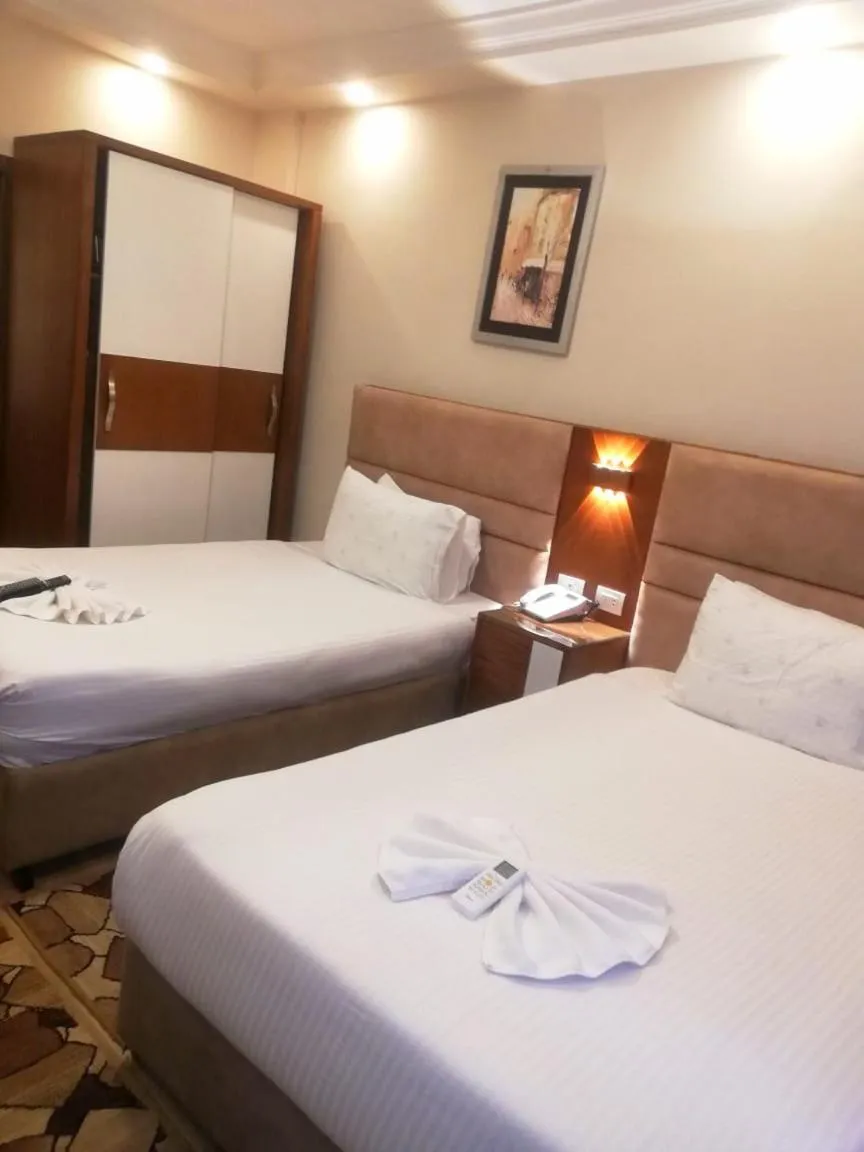 Bed in Jewel Al Nasr Hotel & Apartments