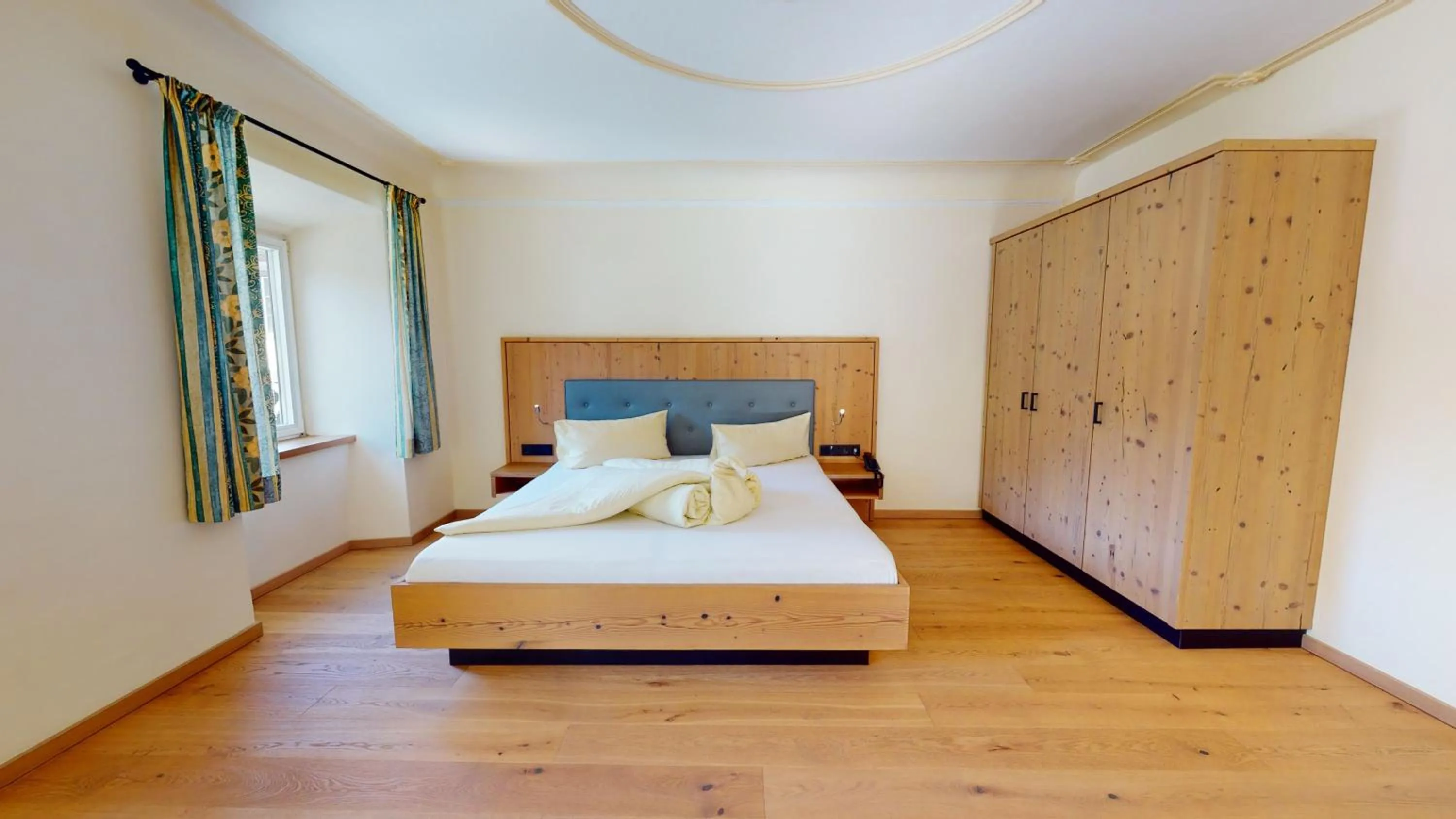 Bed in Hotel Daxer