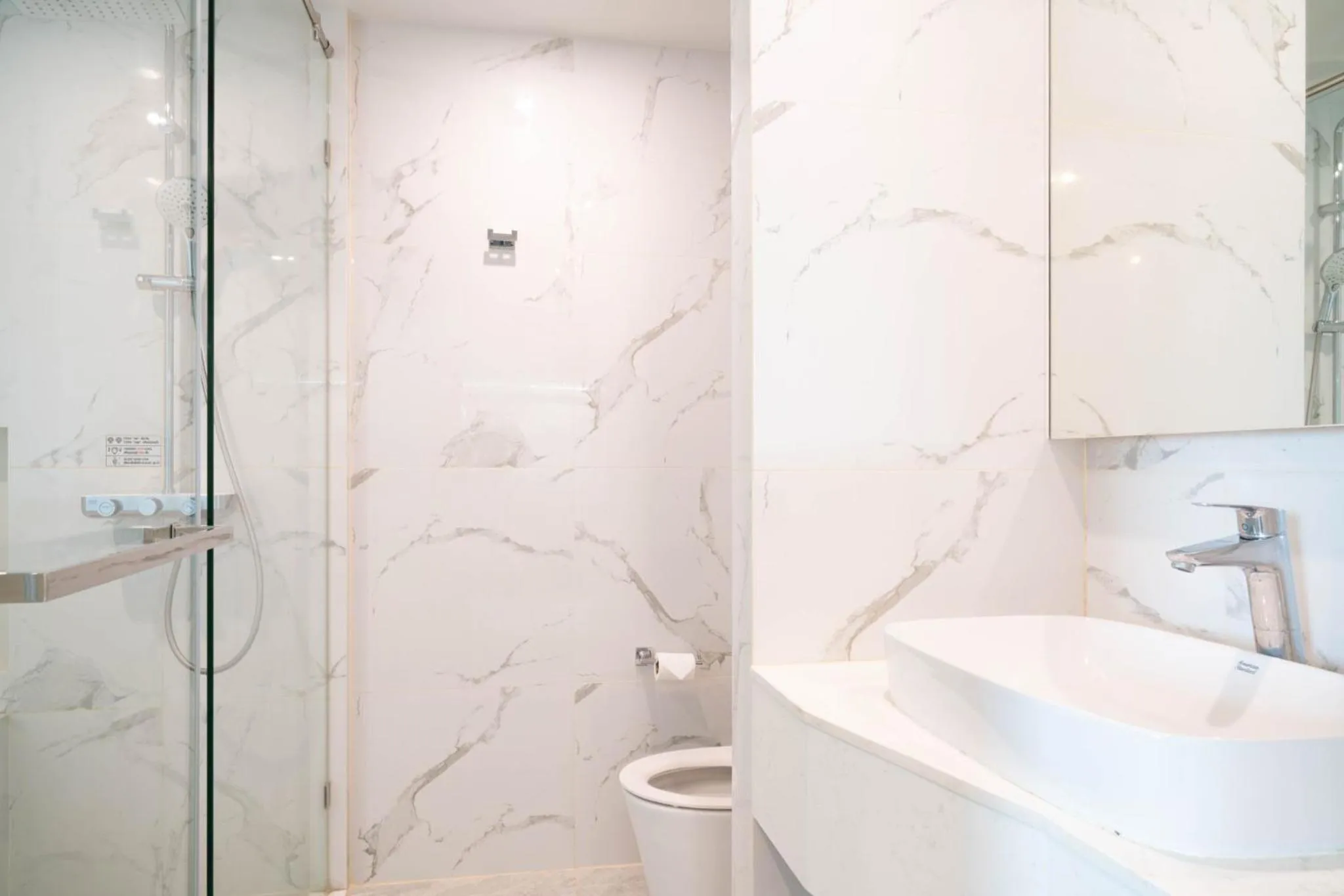 Bathroom in Pattaya Discovery Beach Hotel - SHA Extra Plus