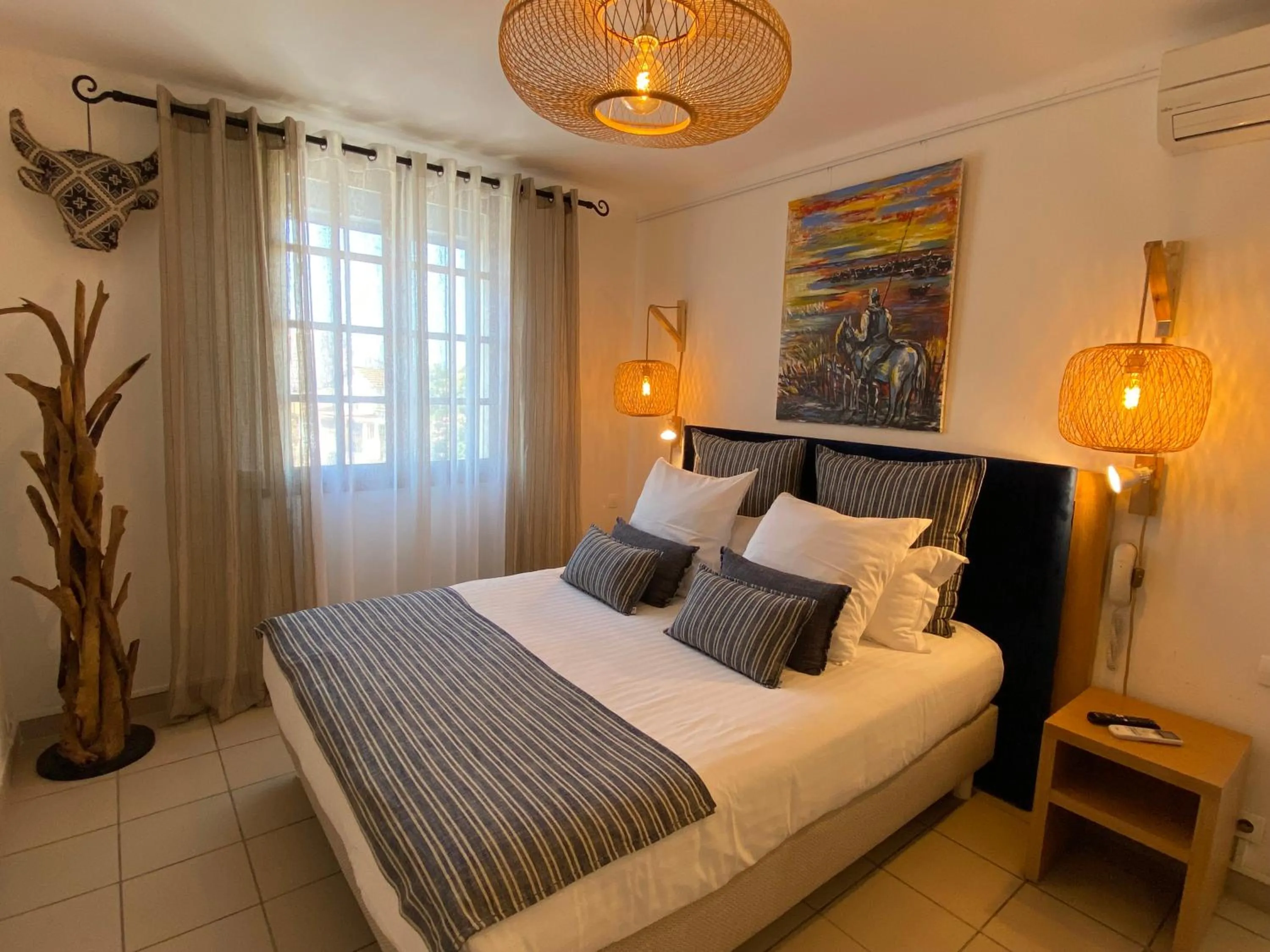 Bed in Hôtel Le Neptune en Camargue