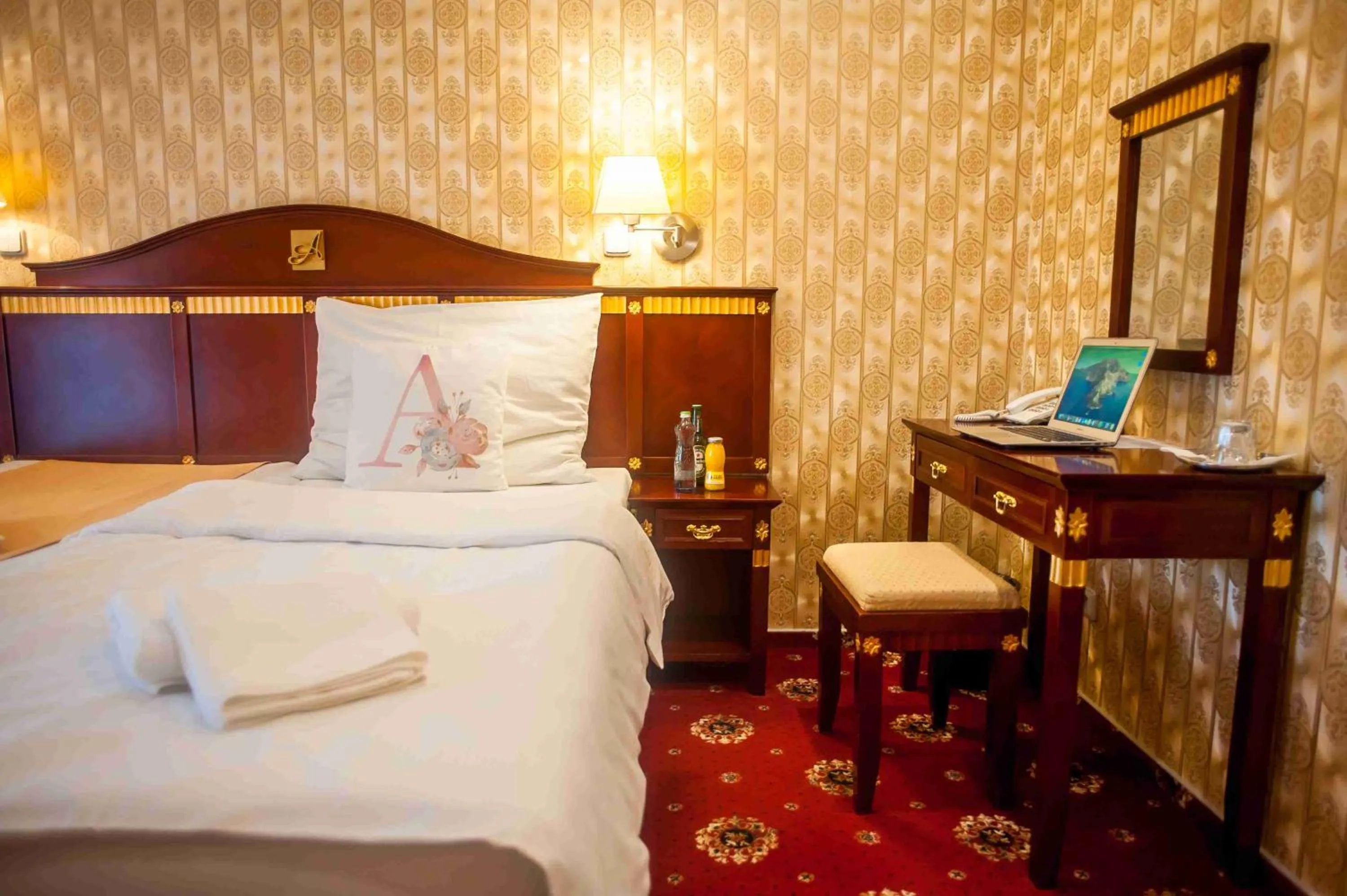 Bed in Hotel Tommy Wellness & Spa