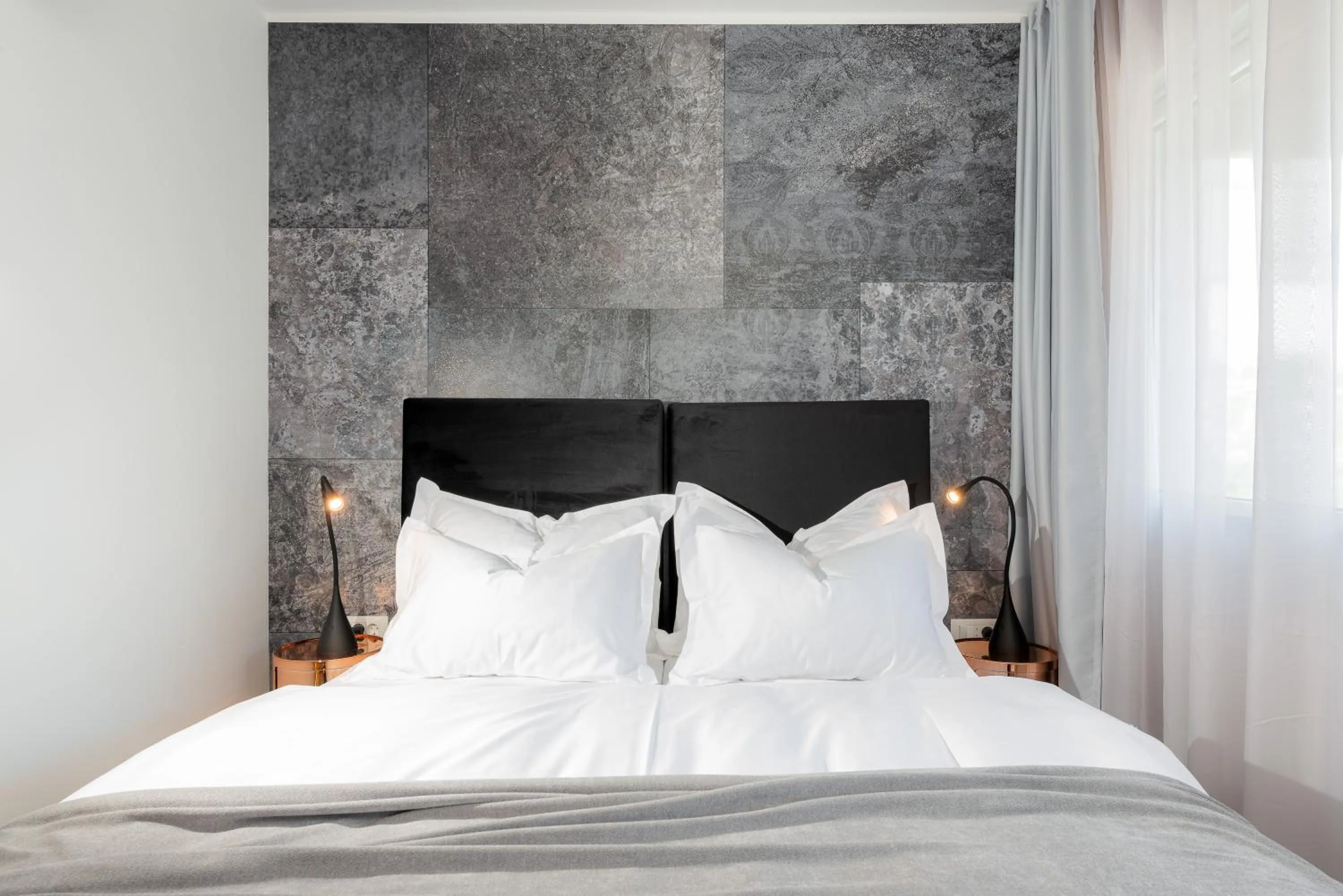 Bed in Skaline Luxury rooms Split