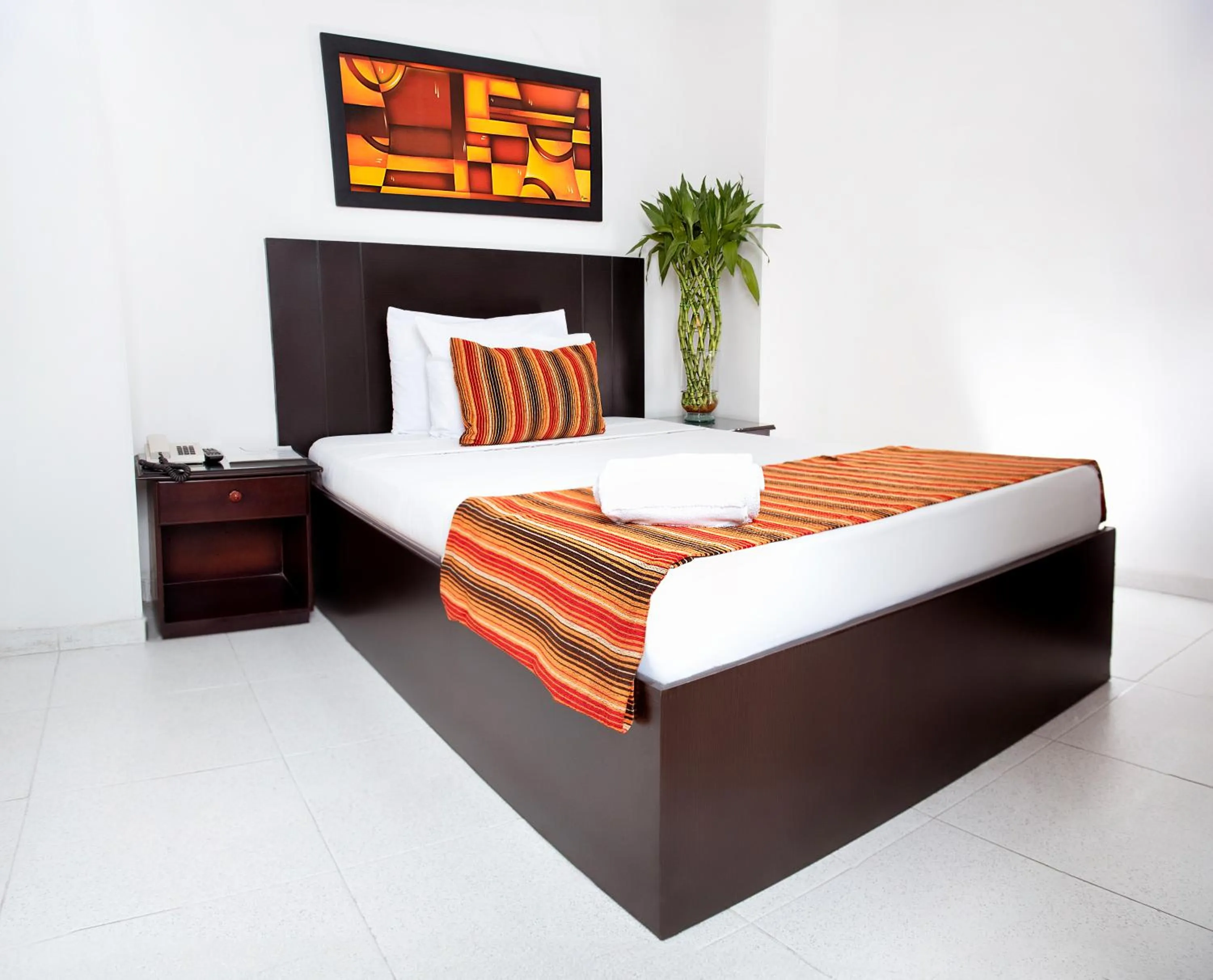 Decorative detail, Bed in TAMA Hotel Granada Real Cali