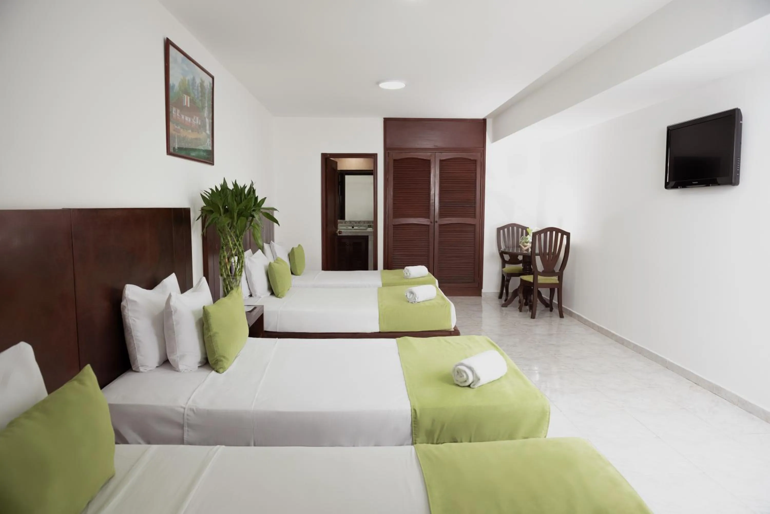 Bed in TAMA Hotel Granada Real Cali