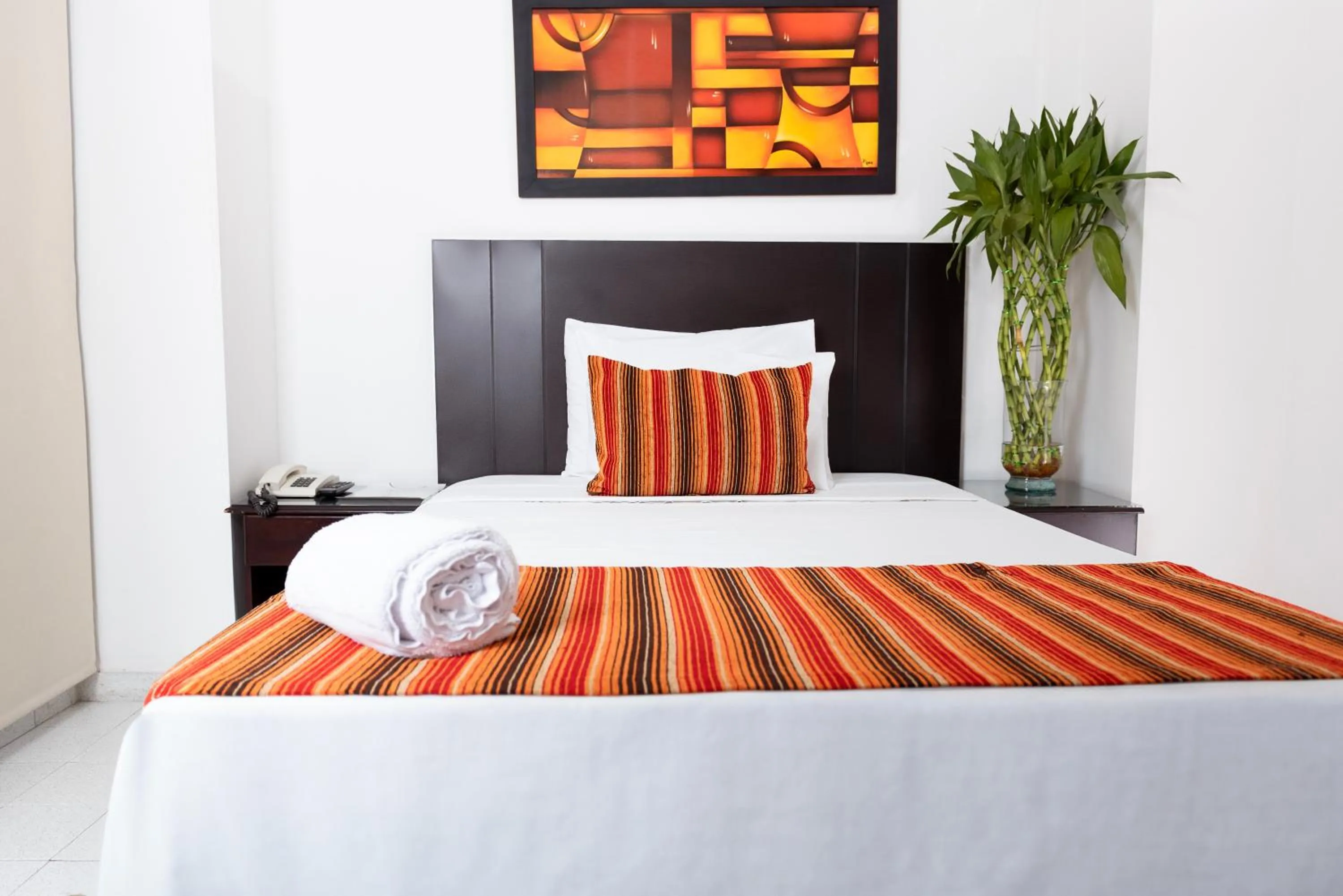 Bed in TAMA Hotel Granada Real Cali