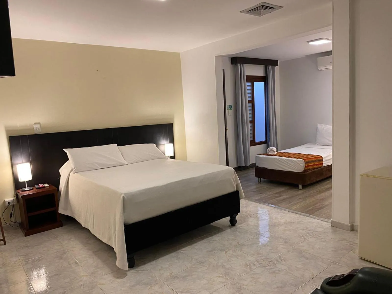 Bed in TAMA Hotel Granada Real Cali