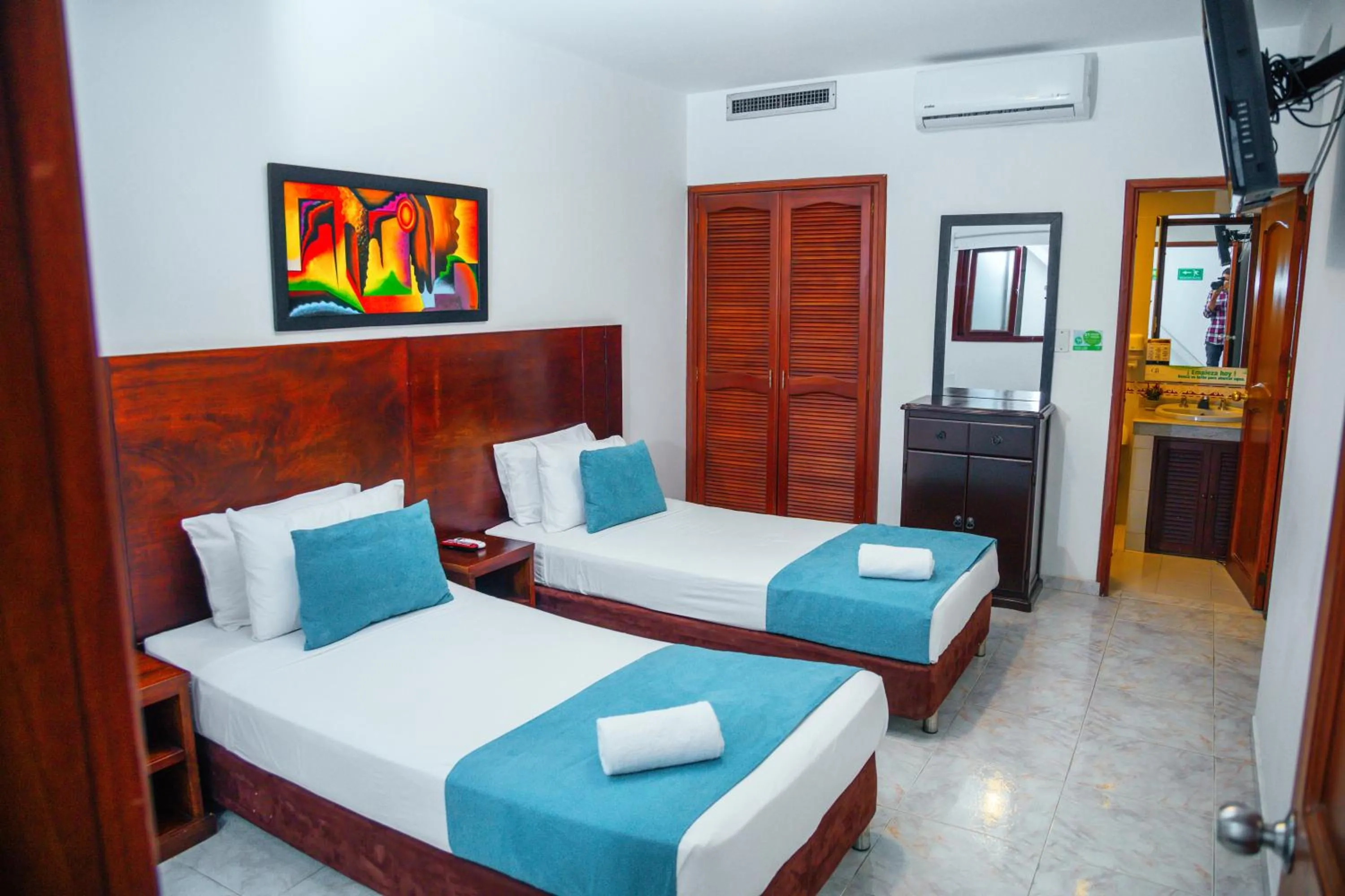 Bed in TAMA Hotel Granada Real Cali