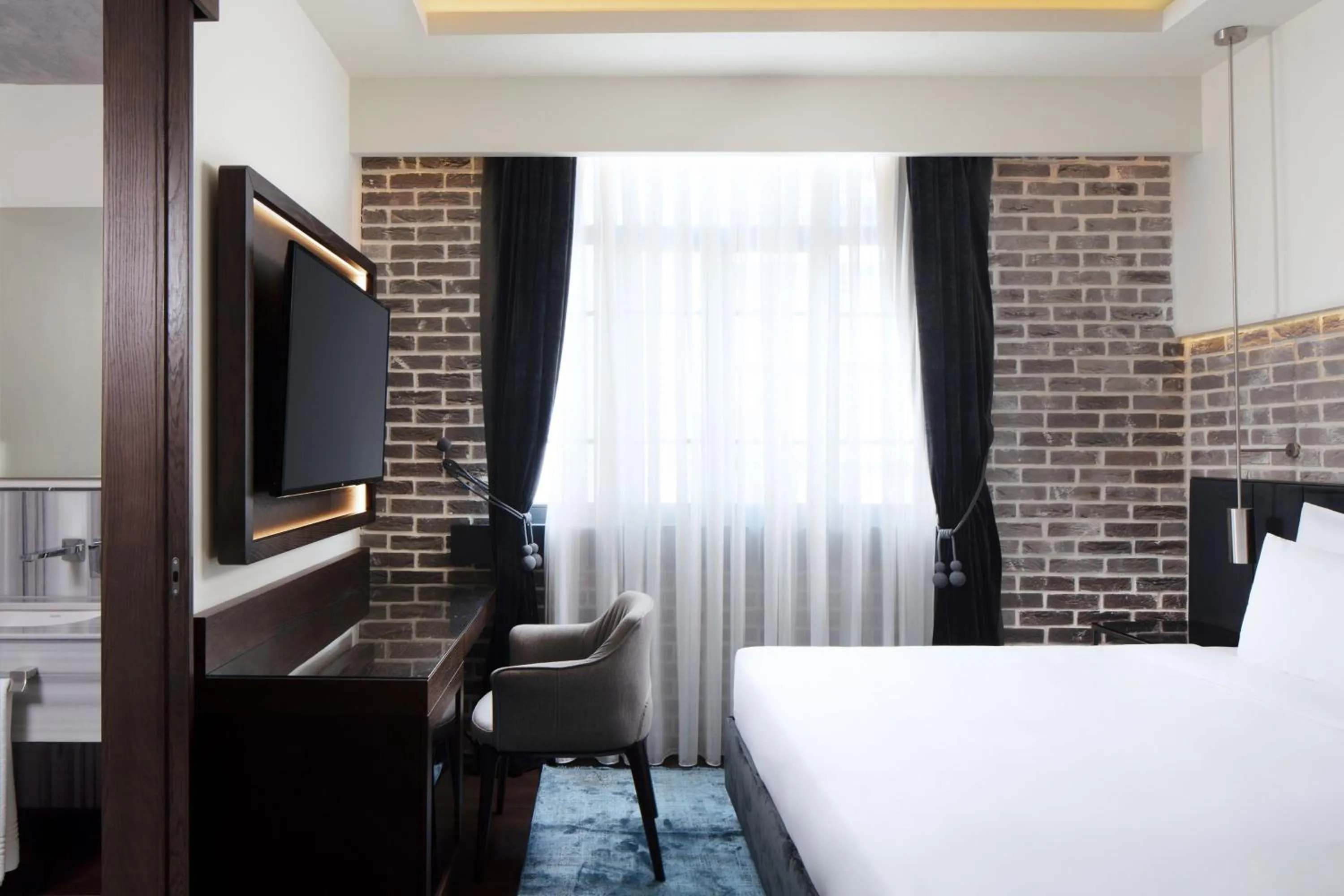 Photo of the whole room, Bed in DeCamondo Galata, a Tribute Portfolio Hotel