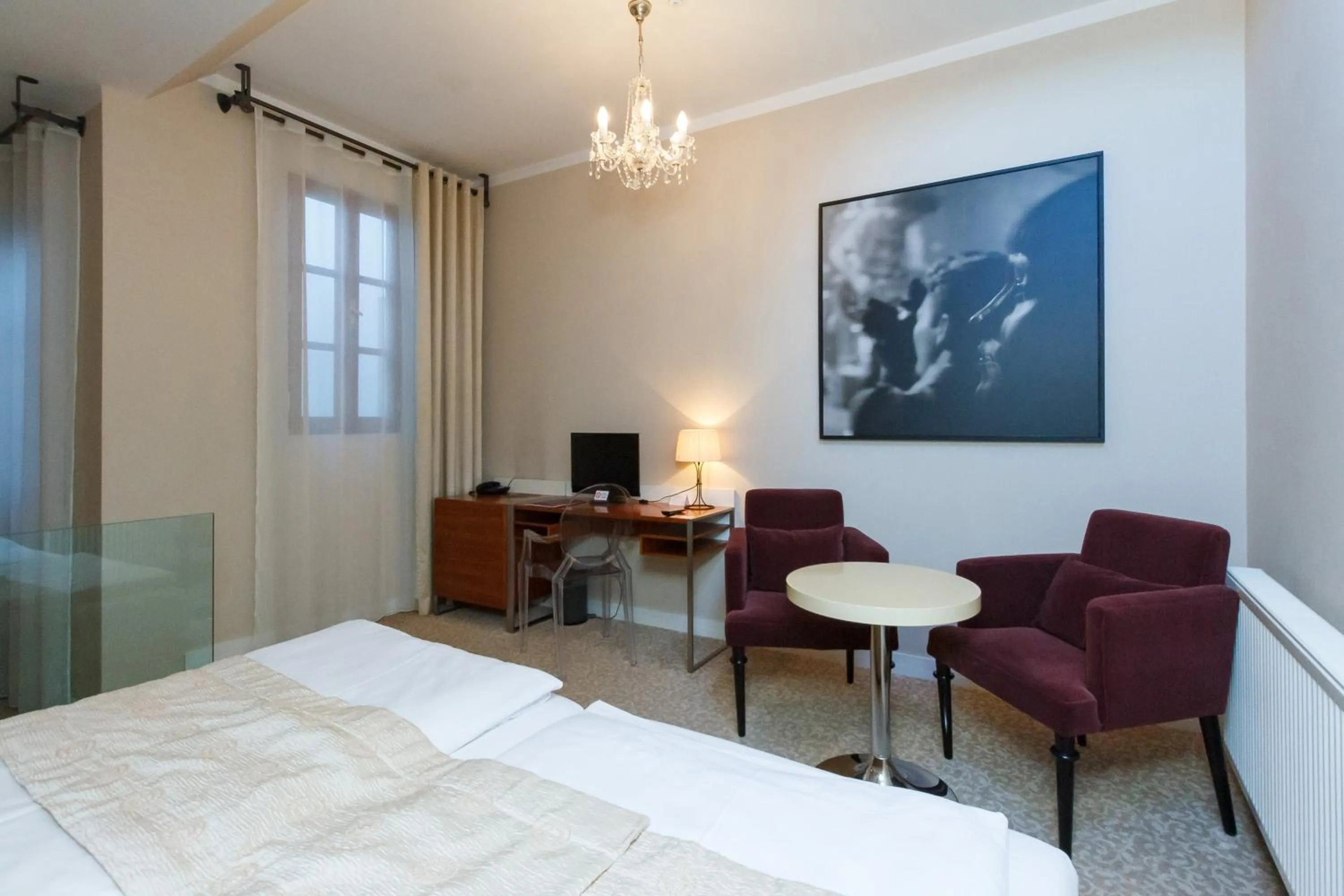 Seating area, Bed in Hotel Aplaus