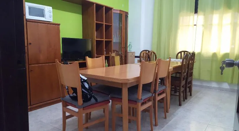 Communal lounge/ TV room in Hostel Penedes