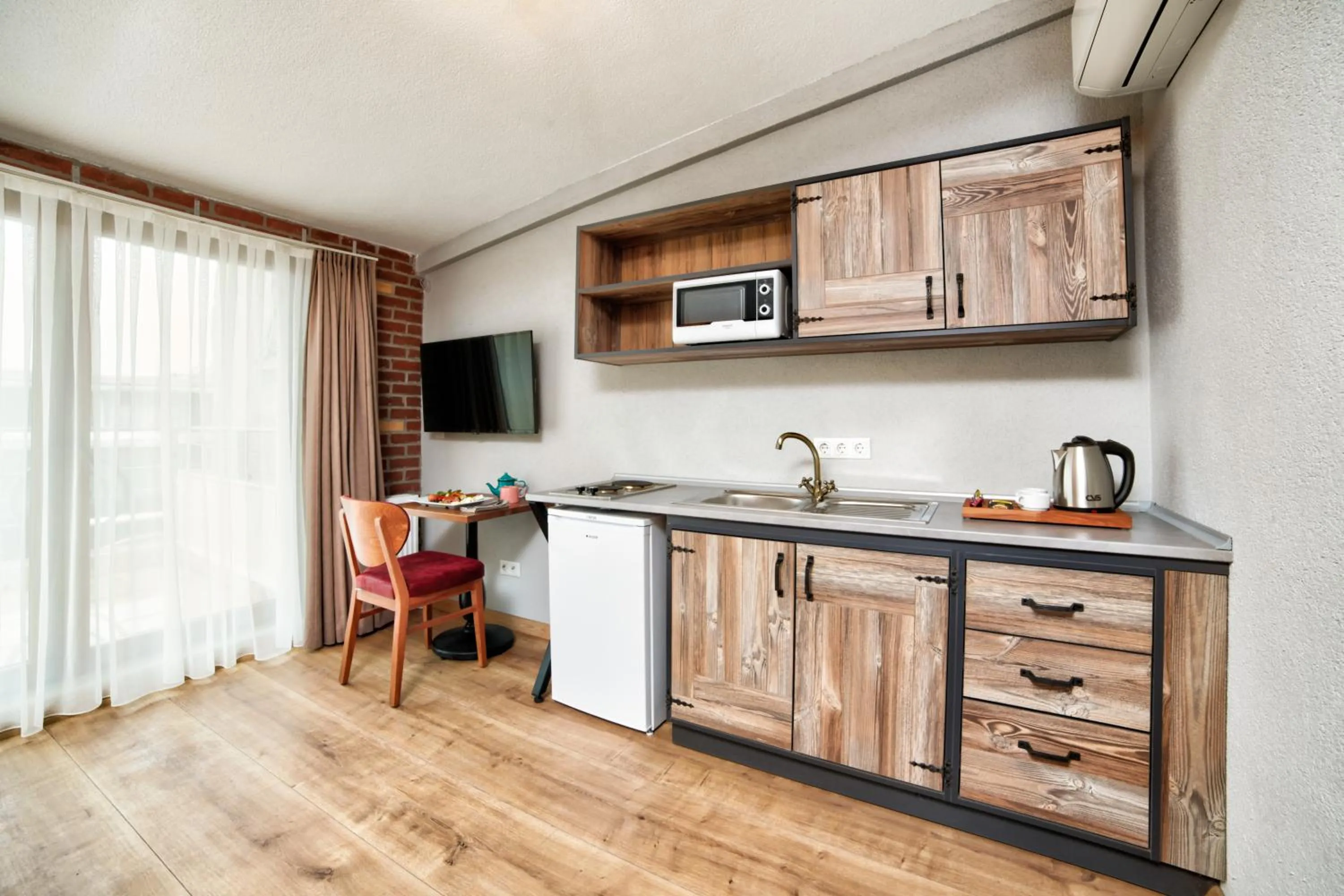 Kitchen or kitchenette in Ardilas Residence