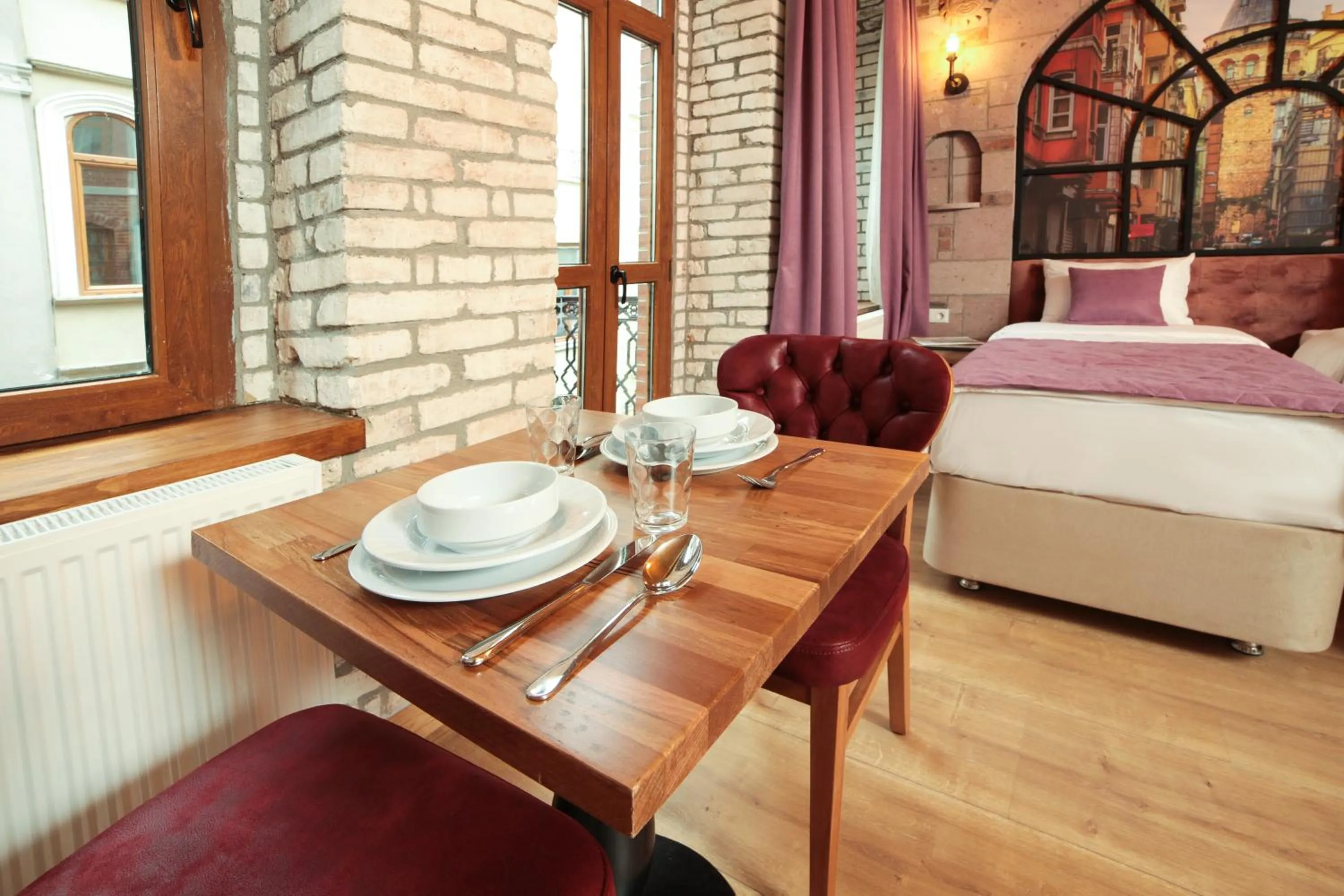 Dining area, Bed in Ardilas Residence