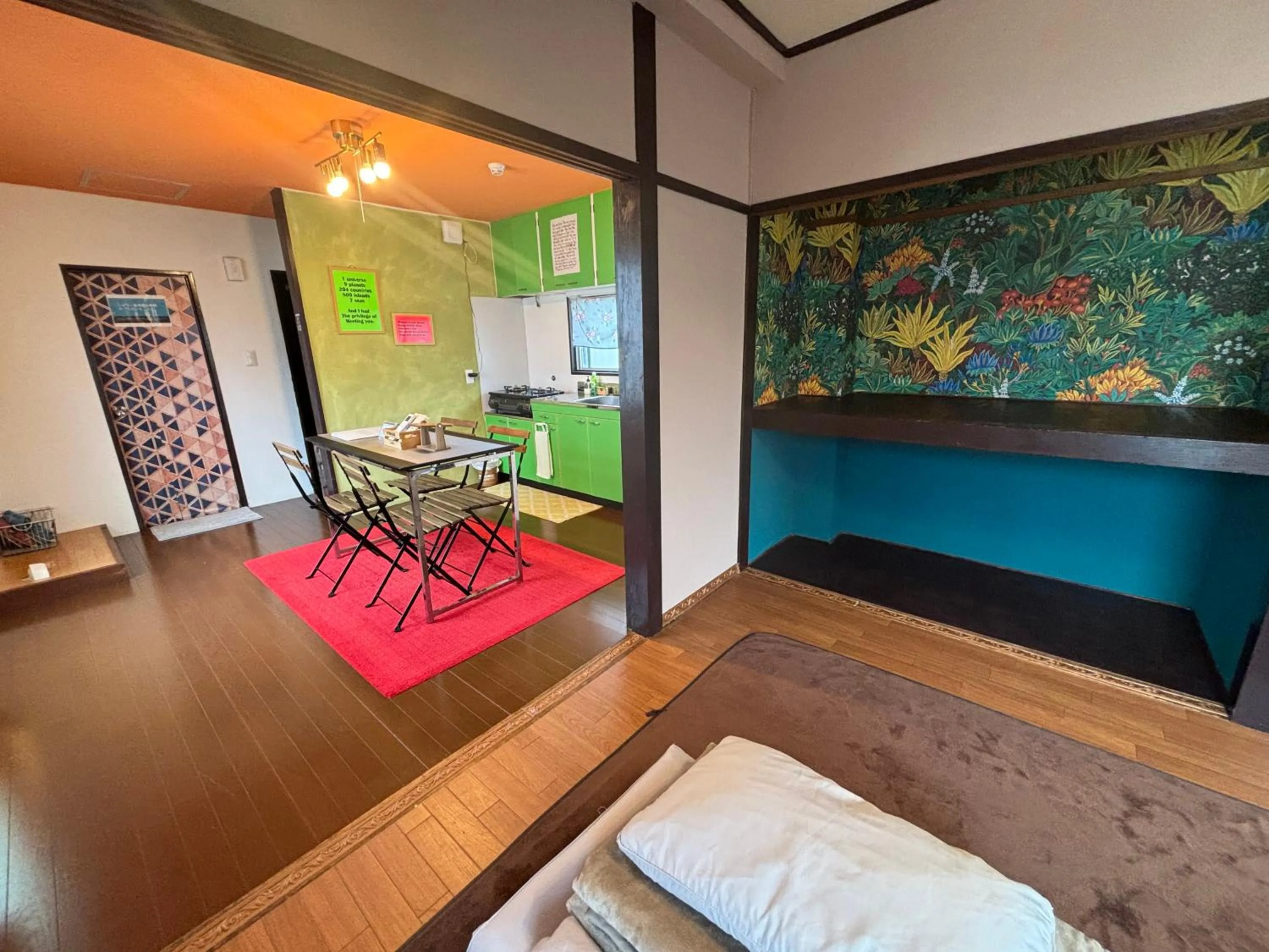 Living room, Bed in 777 Takamatsu Guest House