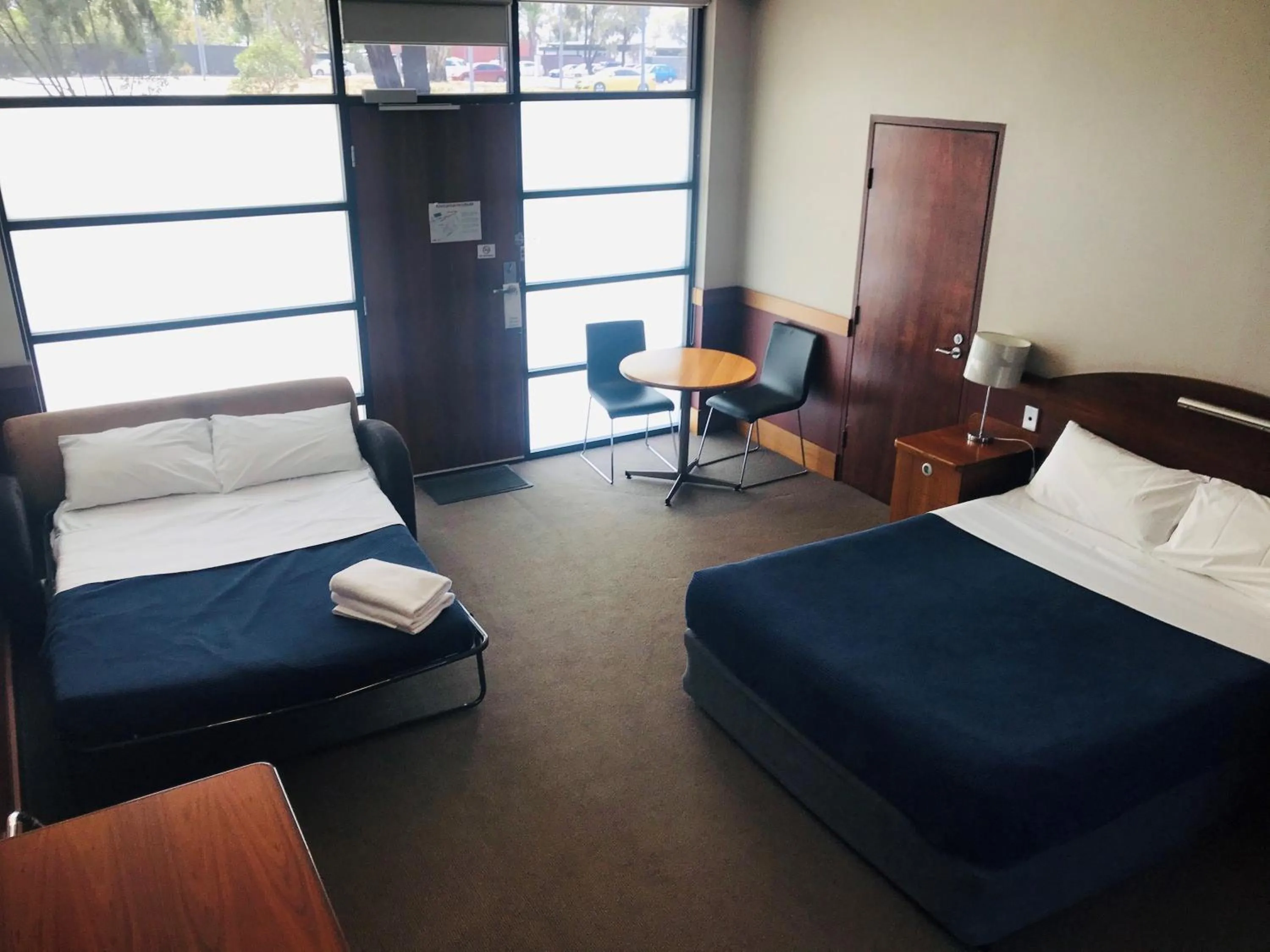 Bed in Highlander Hotel Bar Kitchen Rooftop