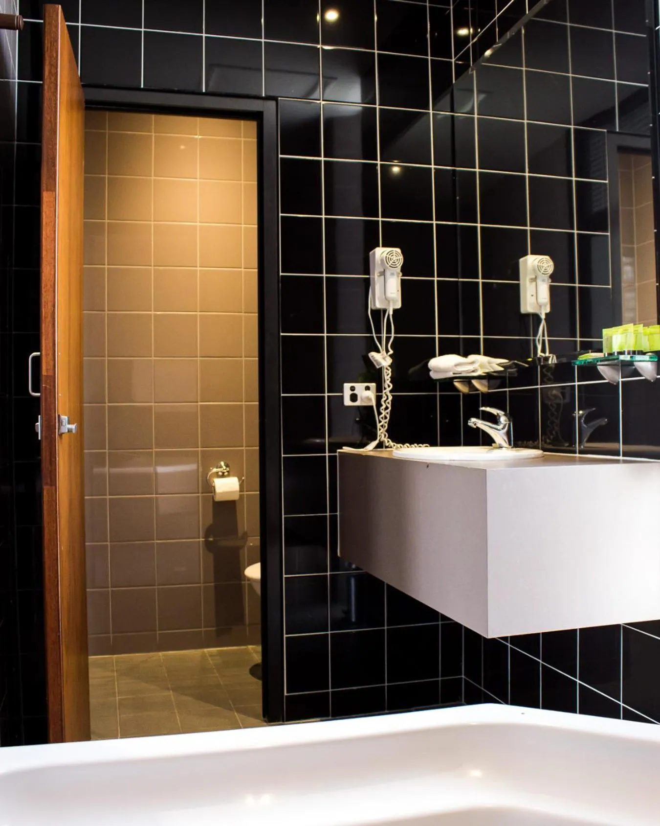 Bathroom in Highlander Hotel Bar Kitchen Rooftop