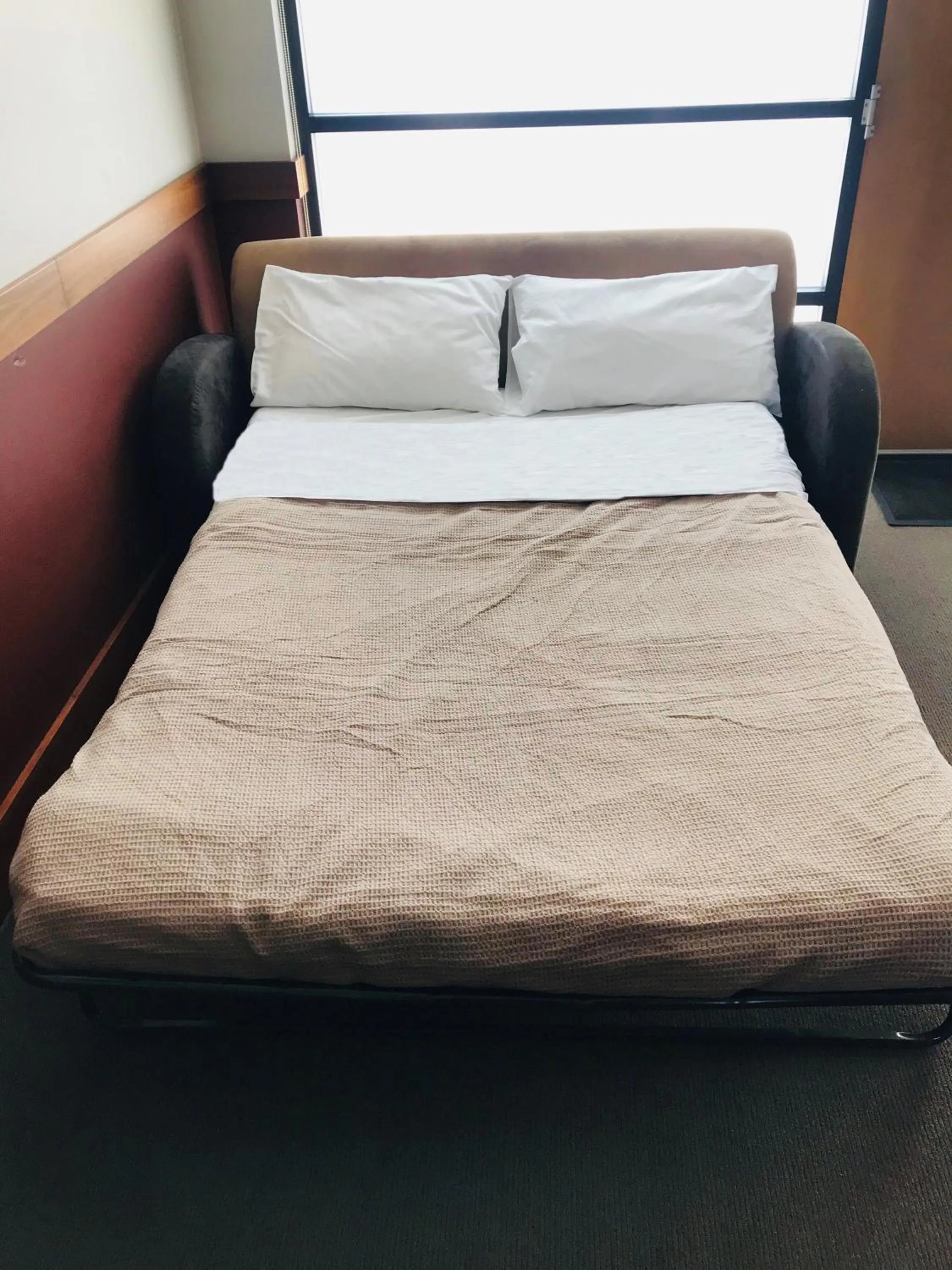 Bed in Highlander Hotel Bar Kitchen Rooftop