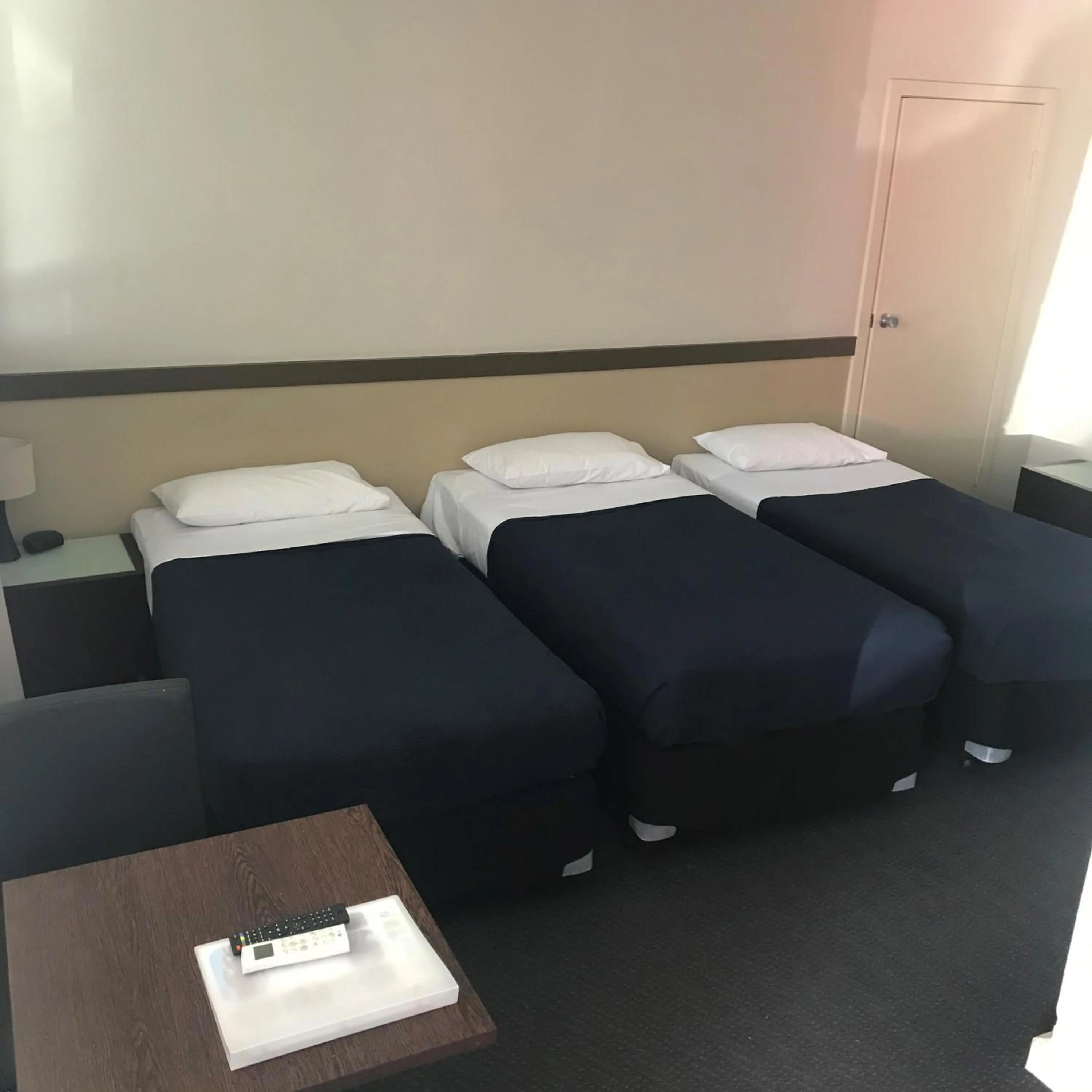 Bed in Highlander Hotel Bar Kitchen Rooftop