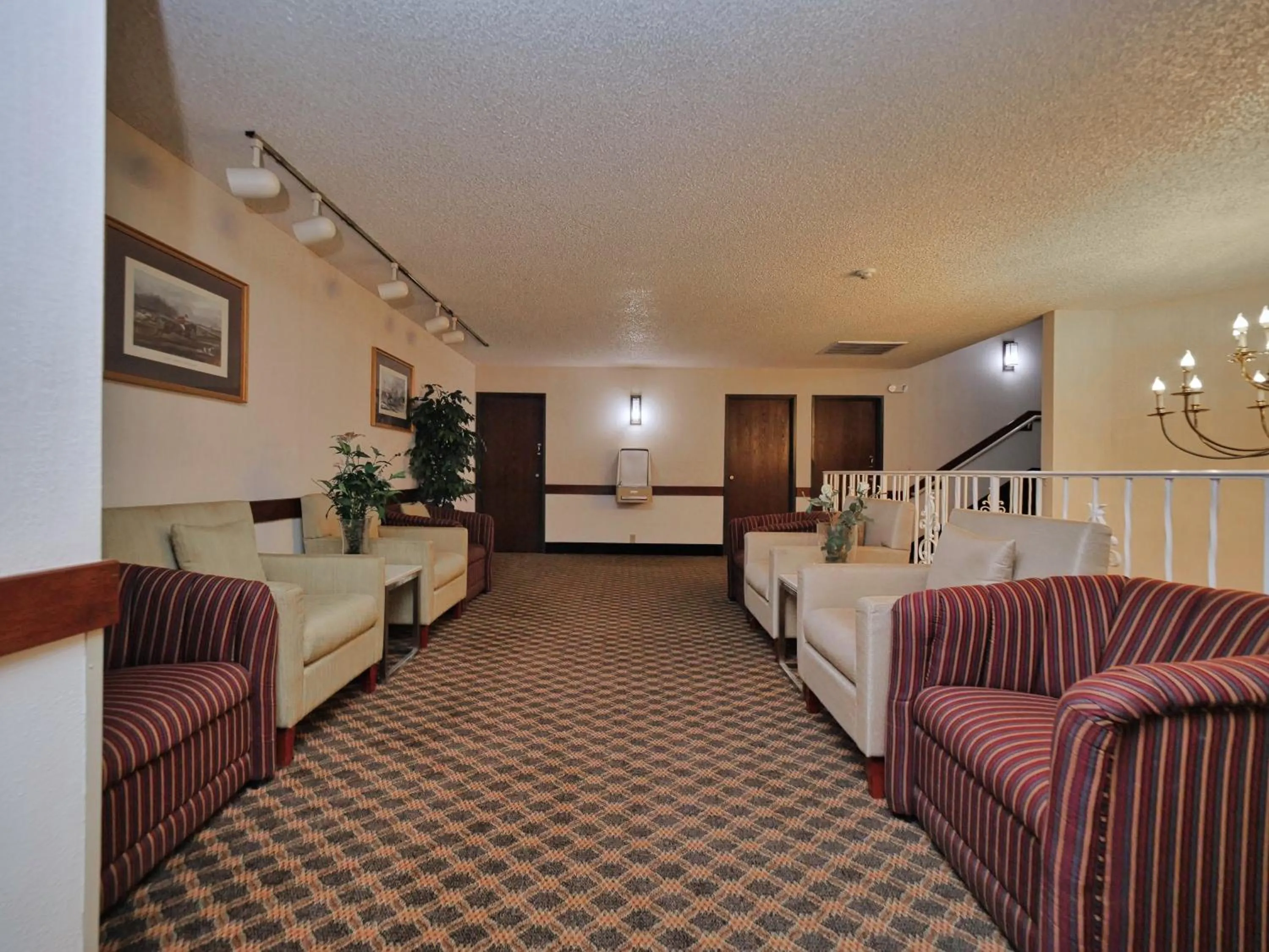 Bed in Red Lion Inn & Suites Auburn