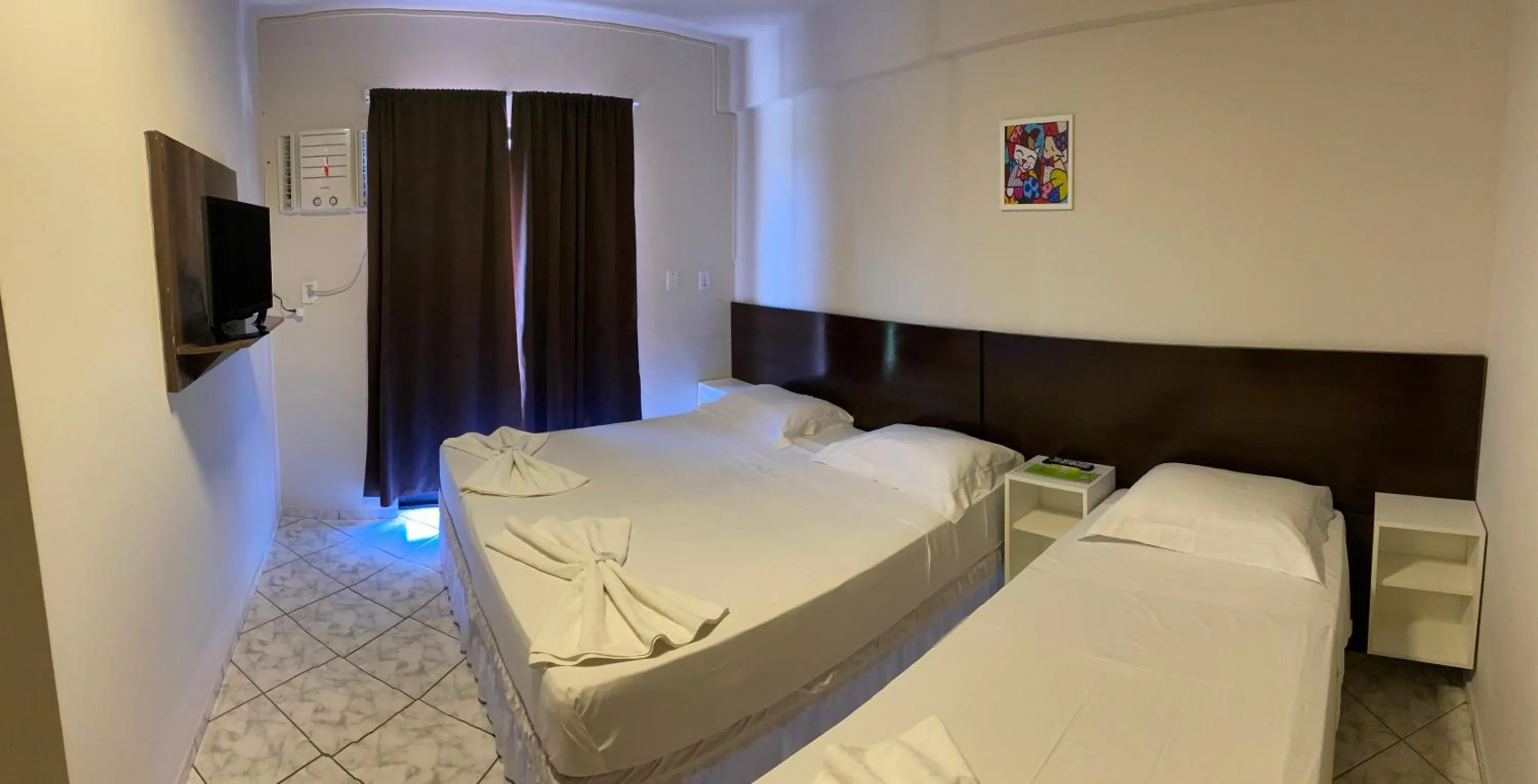 Bed in Pousada Cores