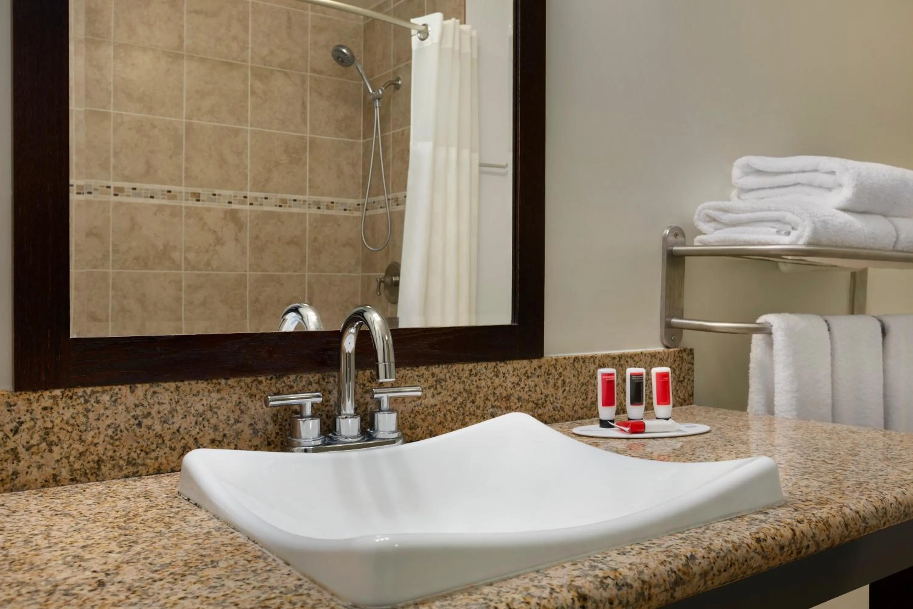 Bathroom in Ramada by Wyndham Oakland Downtown City Center