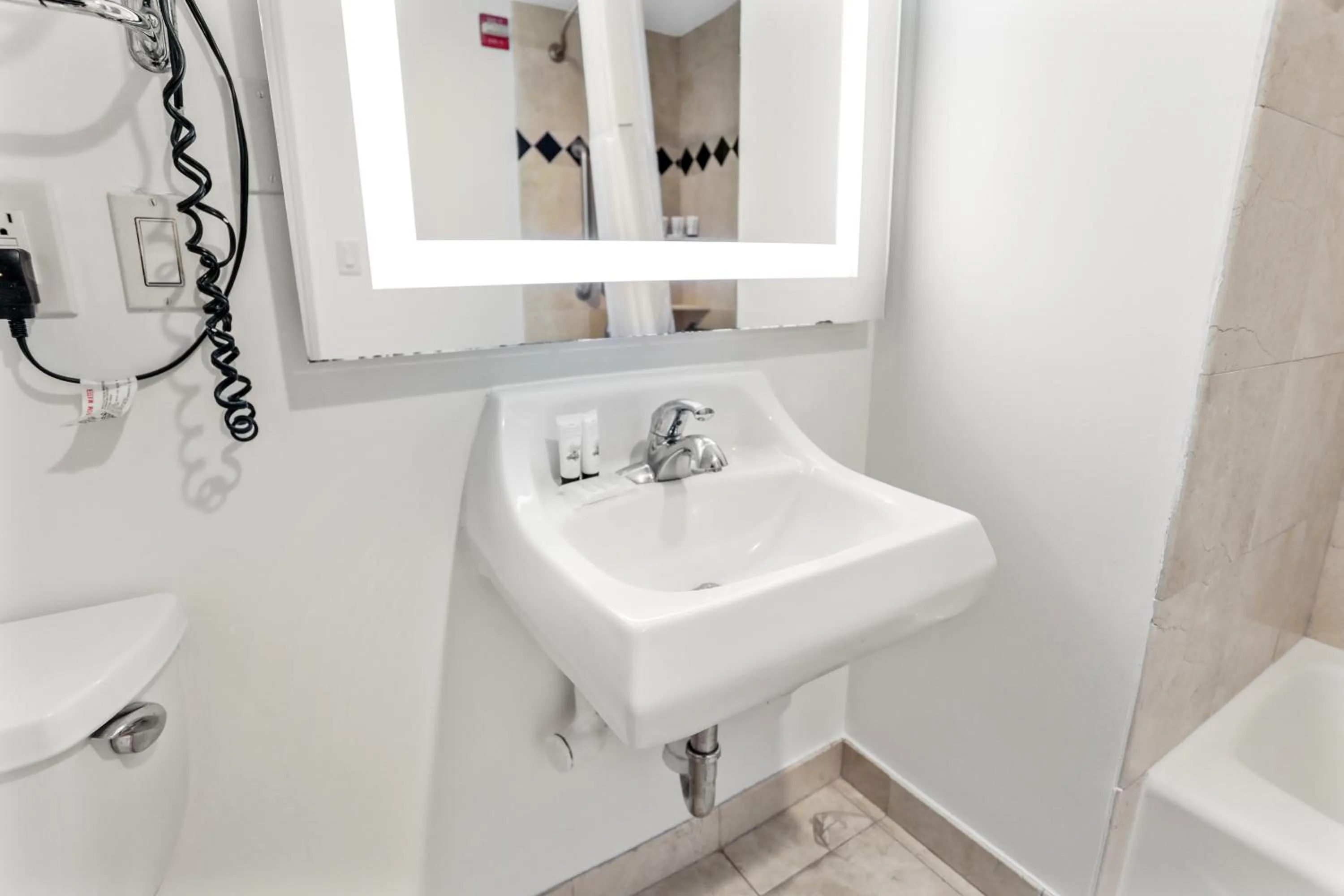 Shower in Signature Inn Berkeley