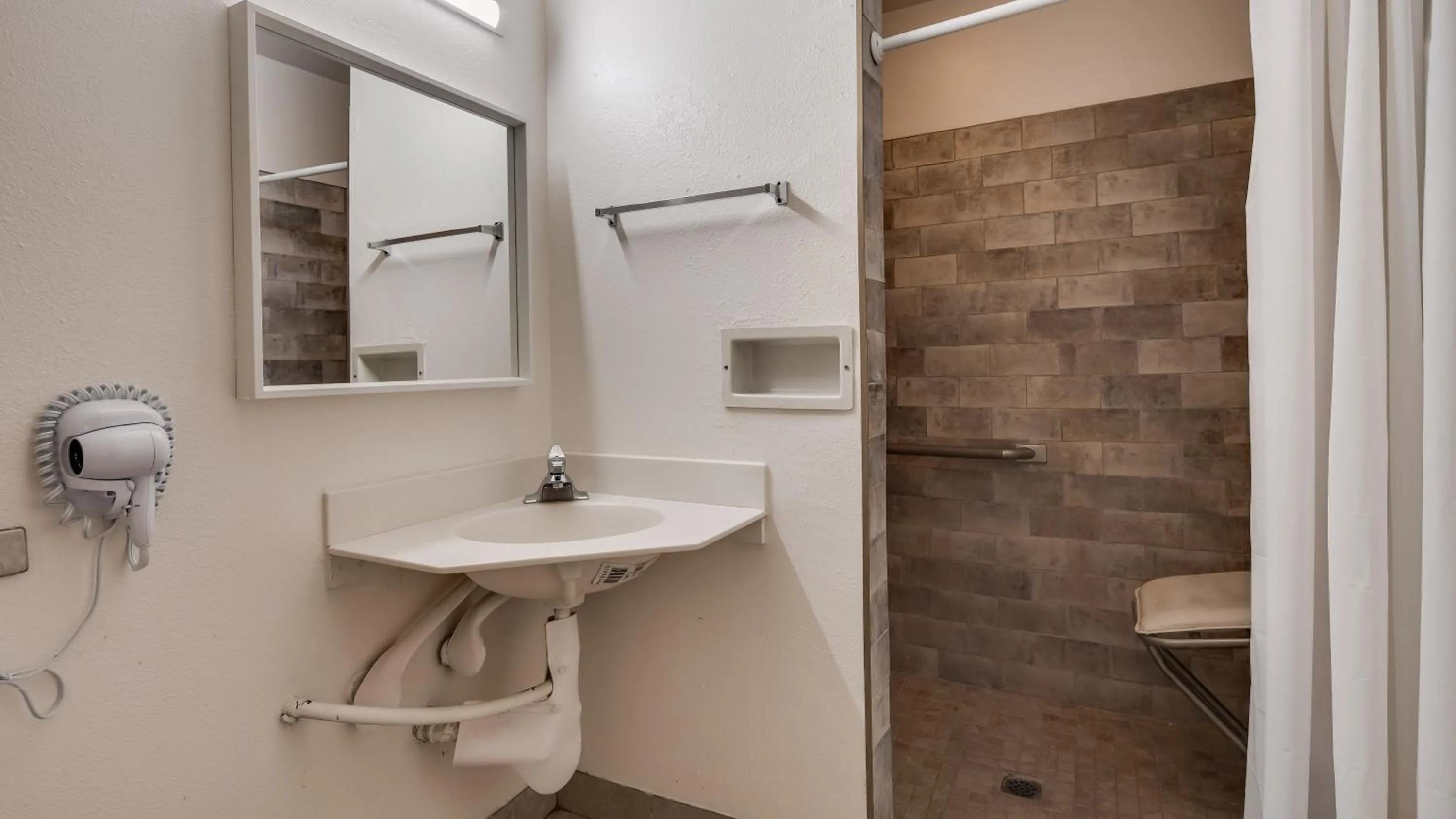 Bathroom in SureStay Hotel by Best Western Buttonwillow