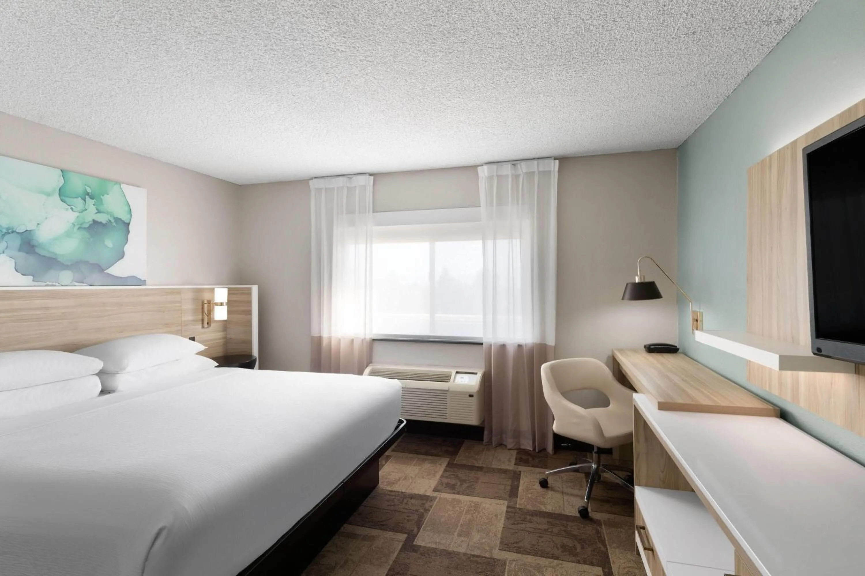 Photo of the whole room, Bed in Wyndham Garden Newark Fremont Silicon Valley