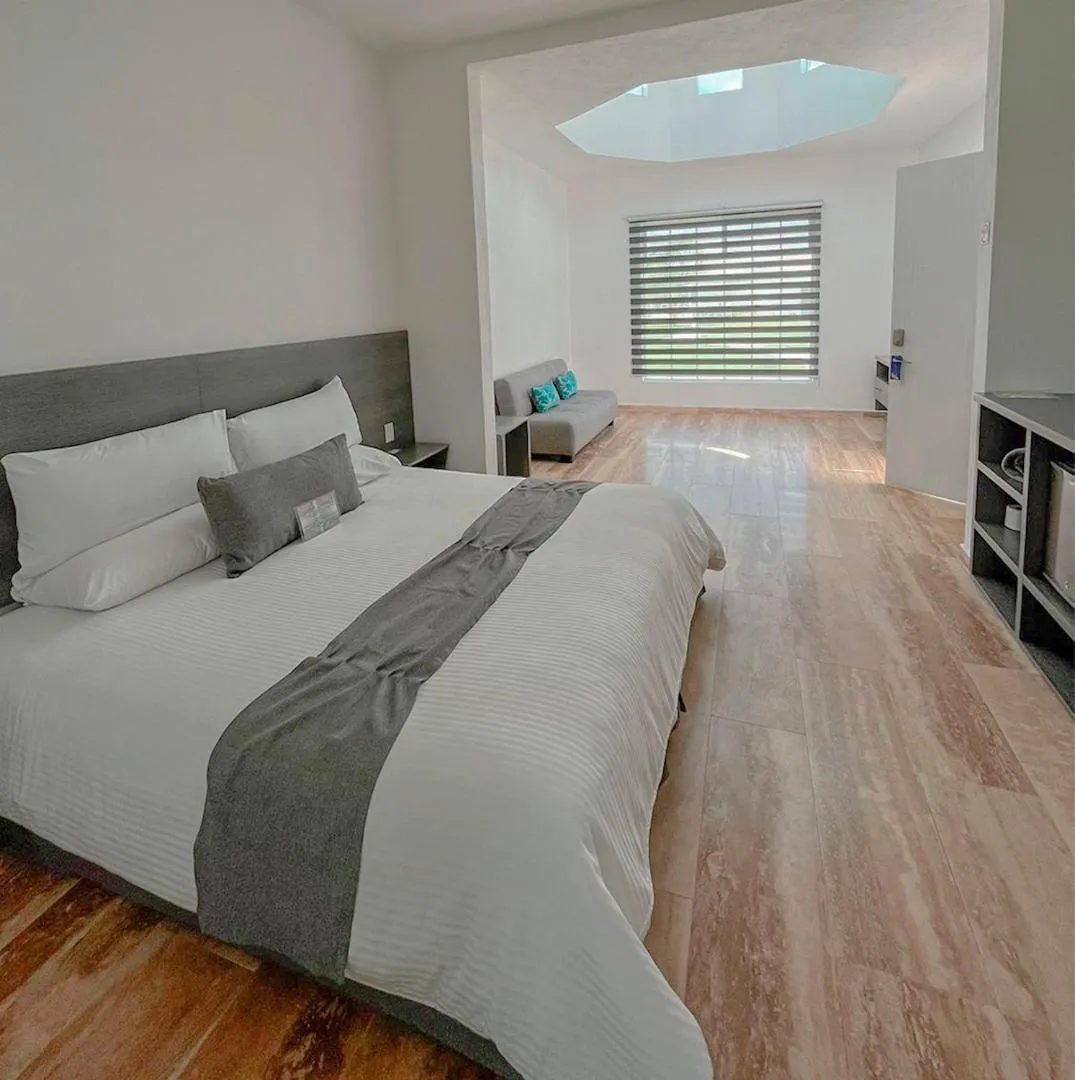 Bed in Hotel Splash Inn