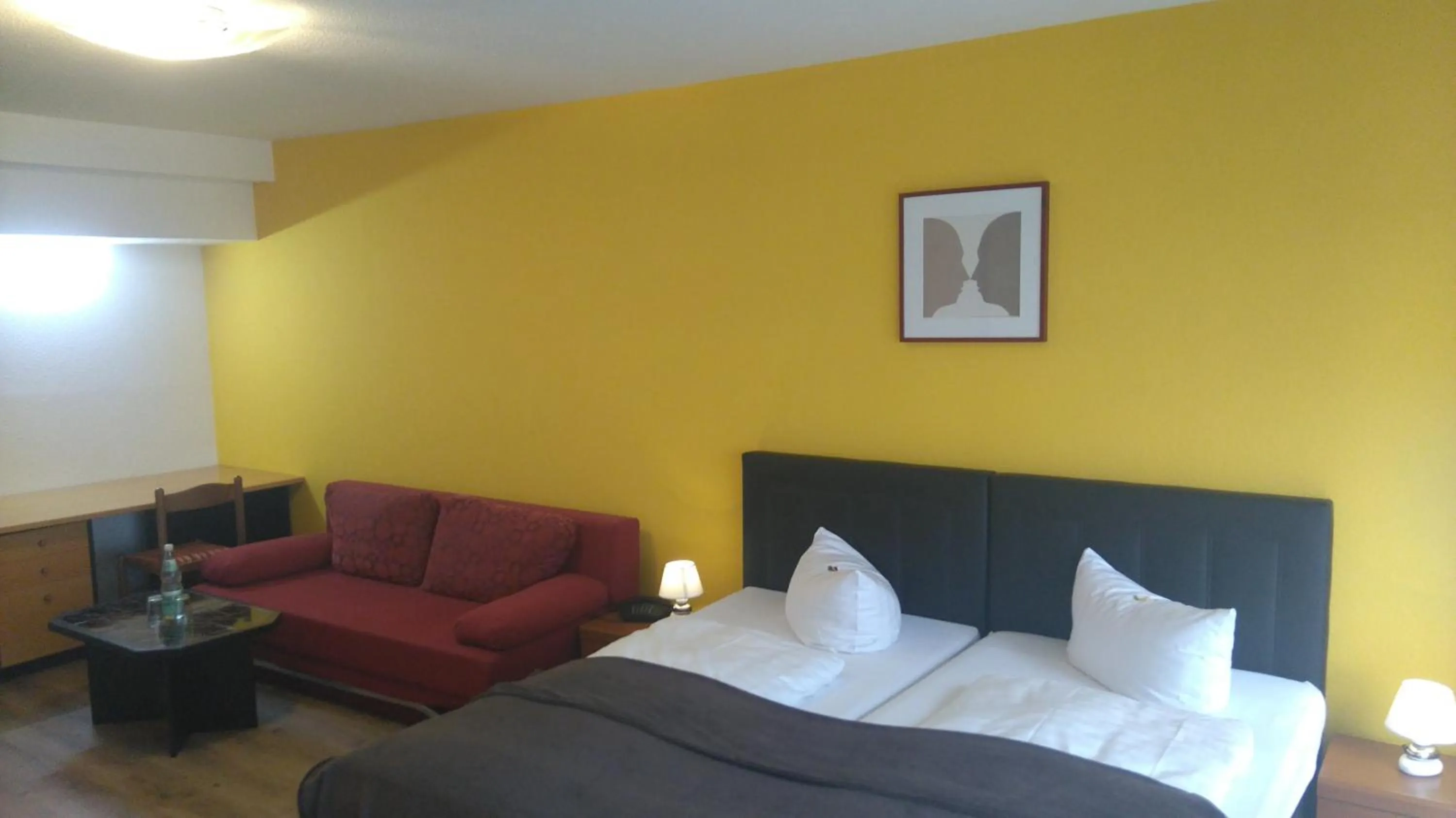 Photo of the whole room, Bed in Hotel Arheilger Hof