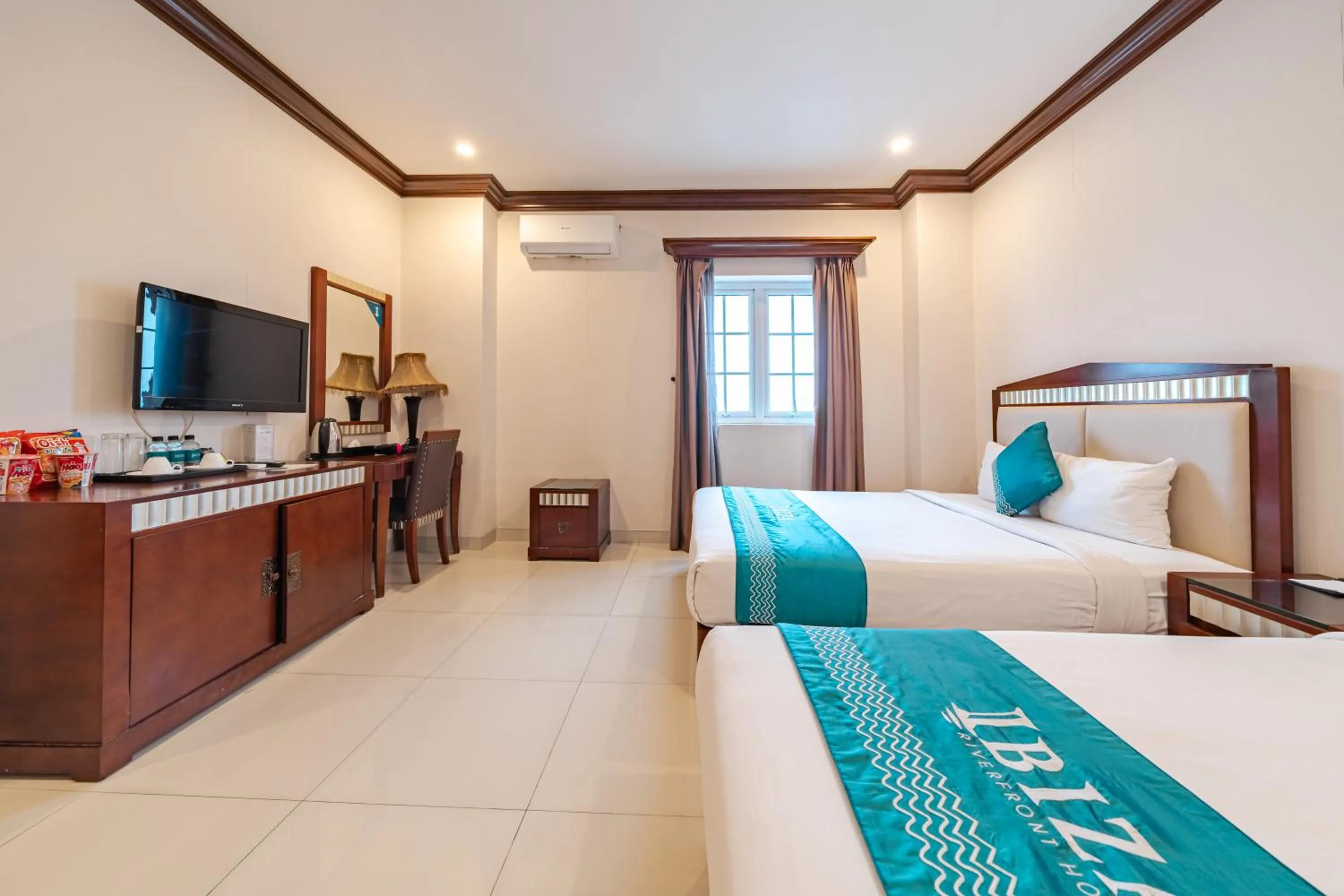 Bed in IBIZA Riverfront Da Nang Hotel