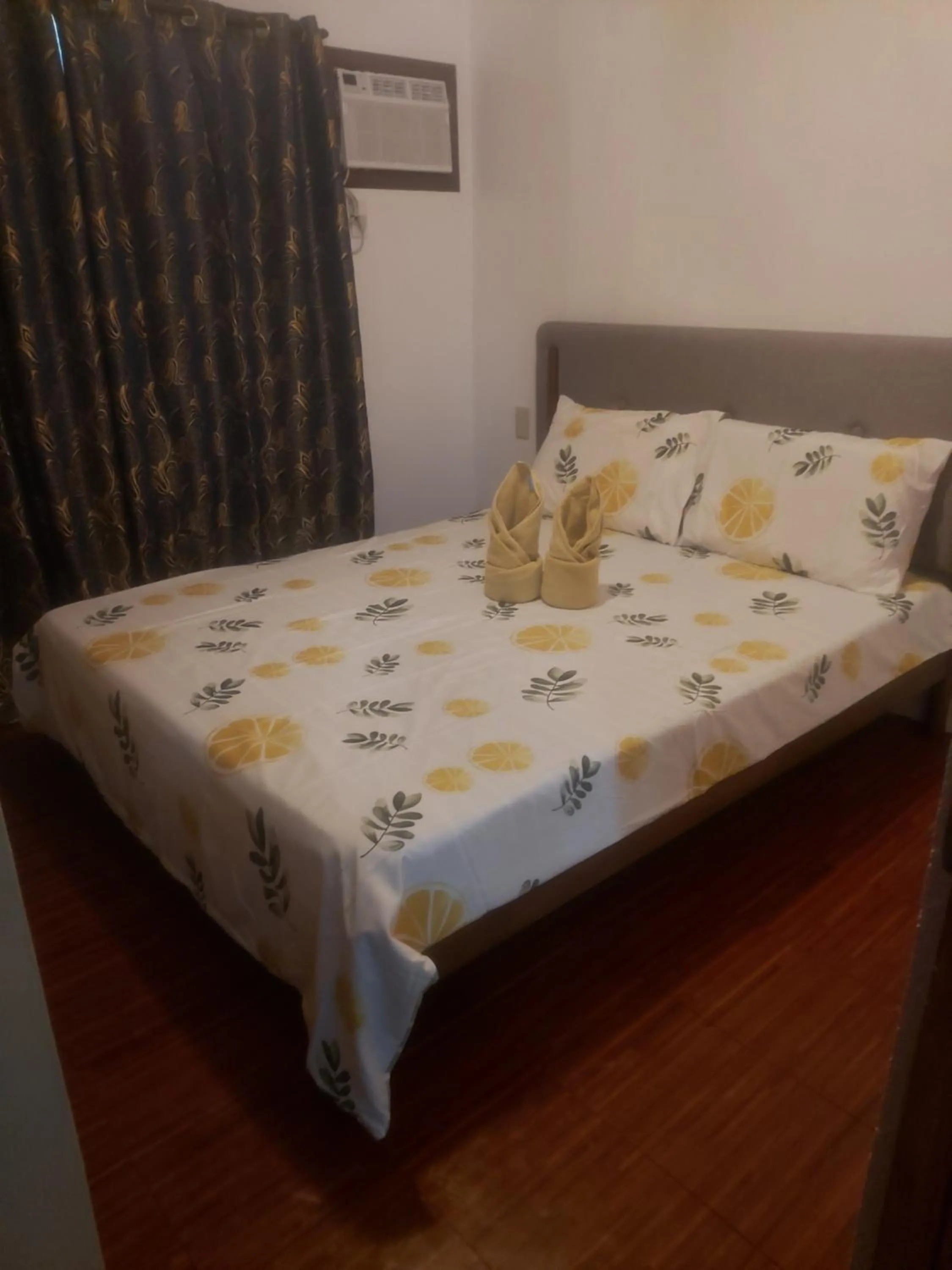 Bed in Anda Poseidon’s Beach Resort