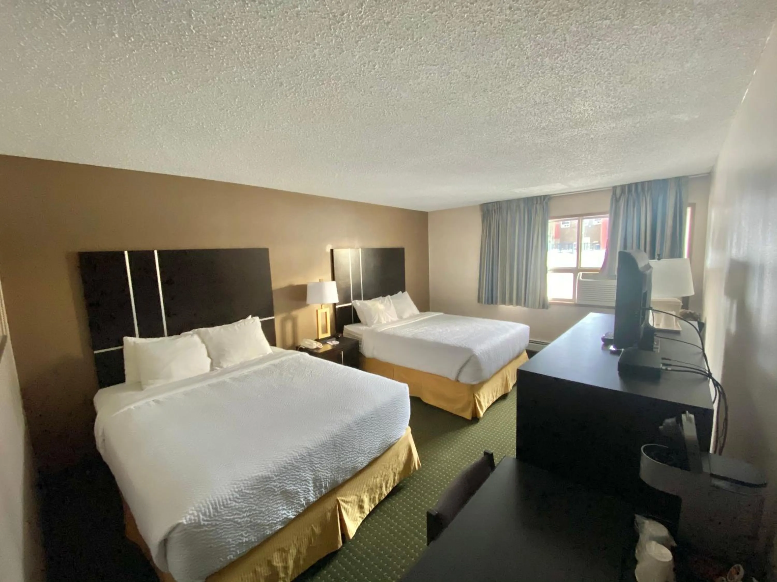 Bedroom, Bed in Ramada by Wyndham Whitecourt